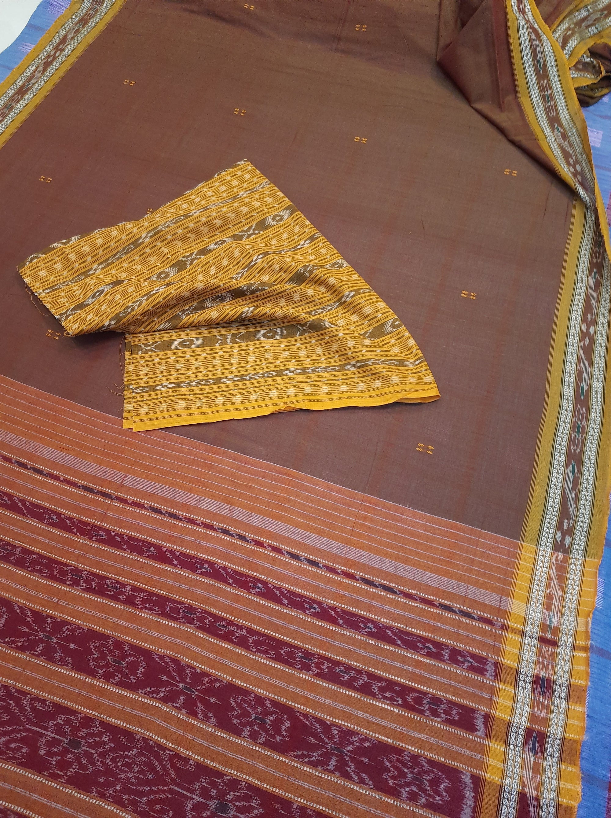 Brown with Golden coloured Odisha Ikat saree  with cotton ikat blouse piece