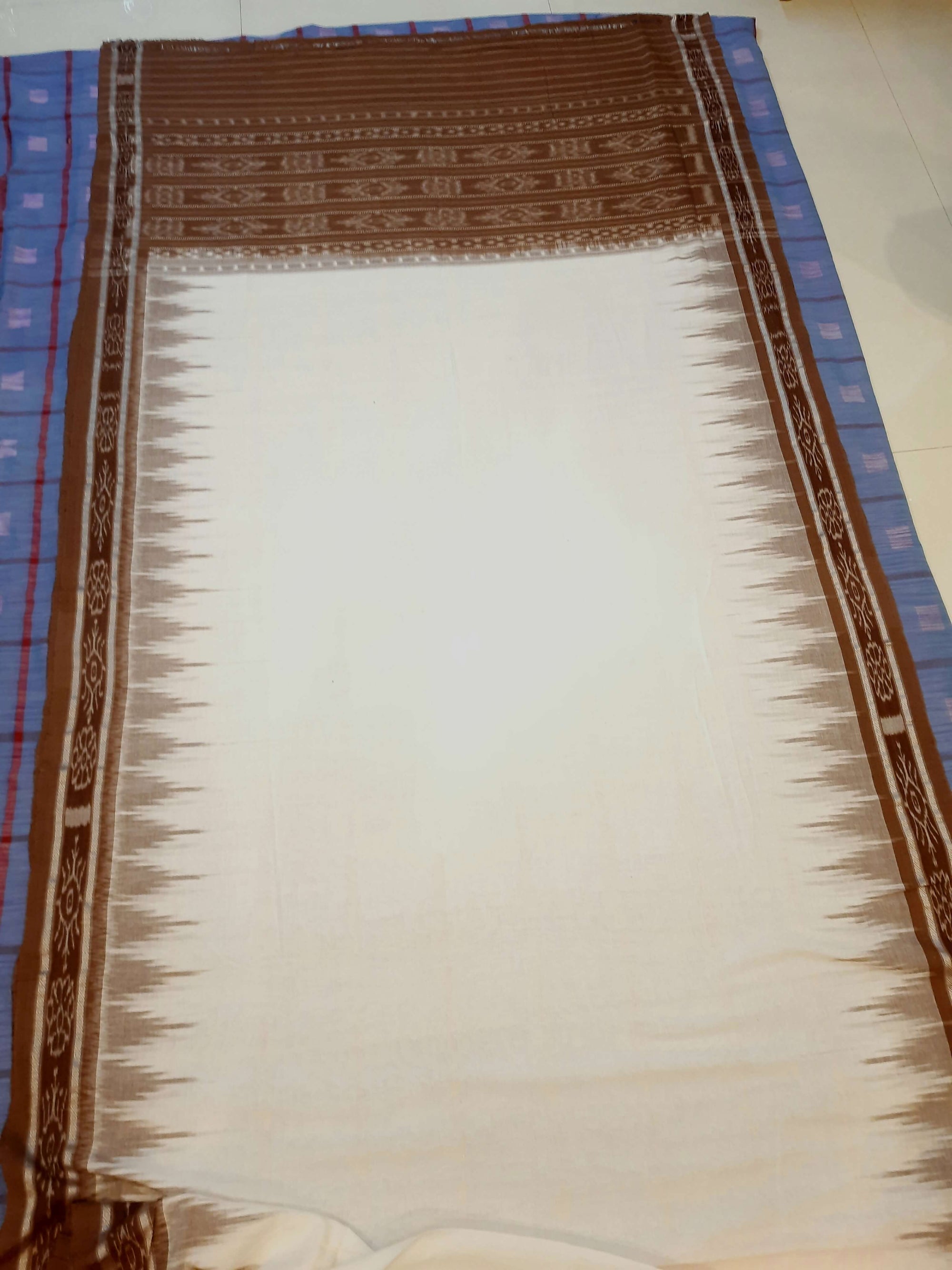 White and Brown coloured Odisha Ikat saree  with cotton ikat blouse piece