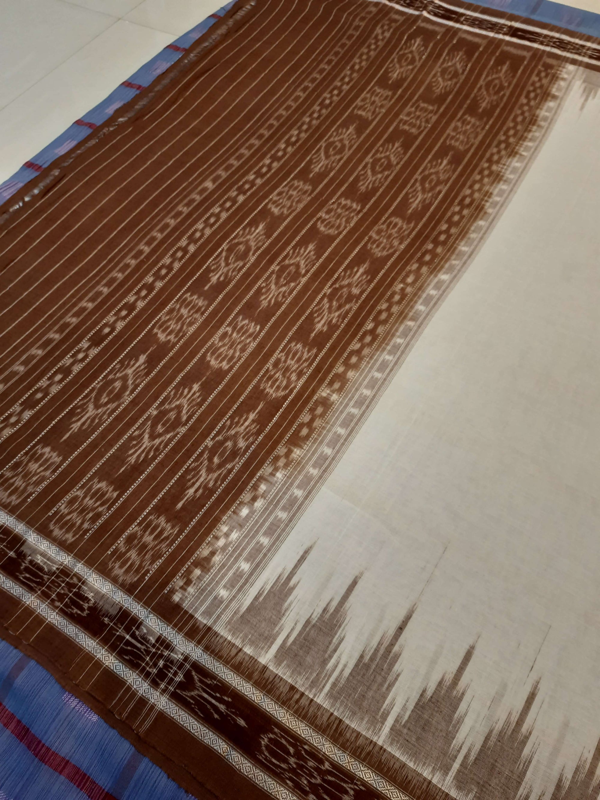 White and Brown coloured Odisha Ikat saree  with cotton ikat blouse piece