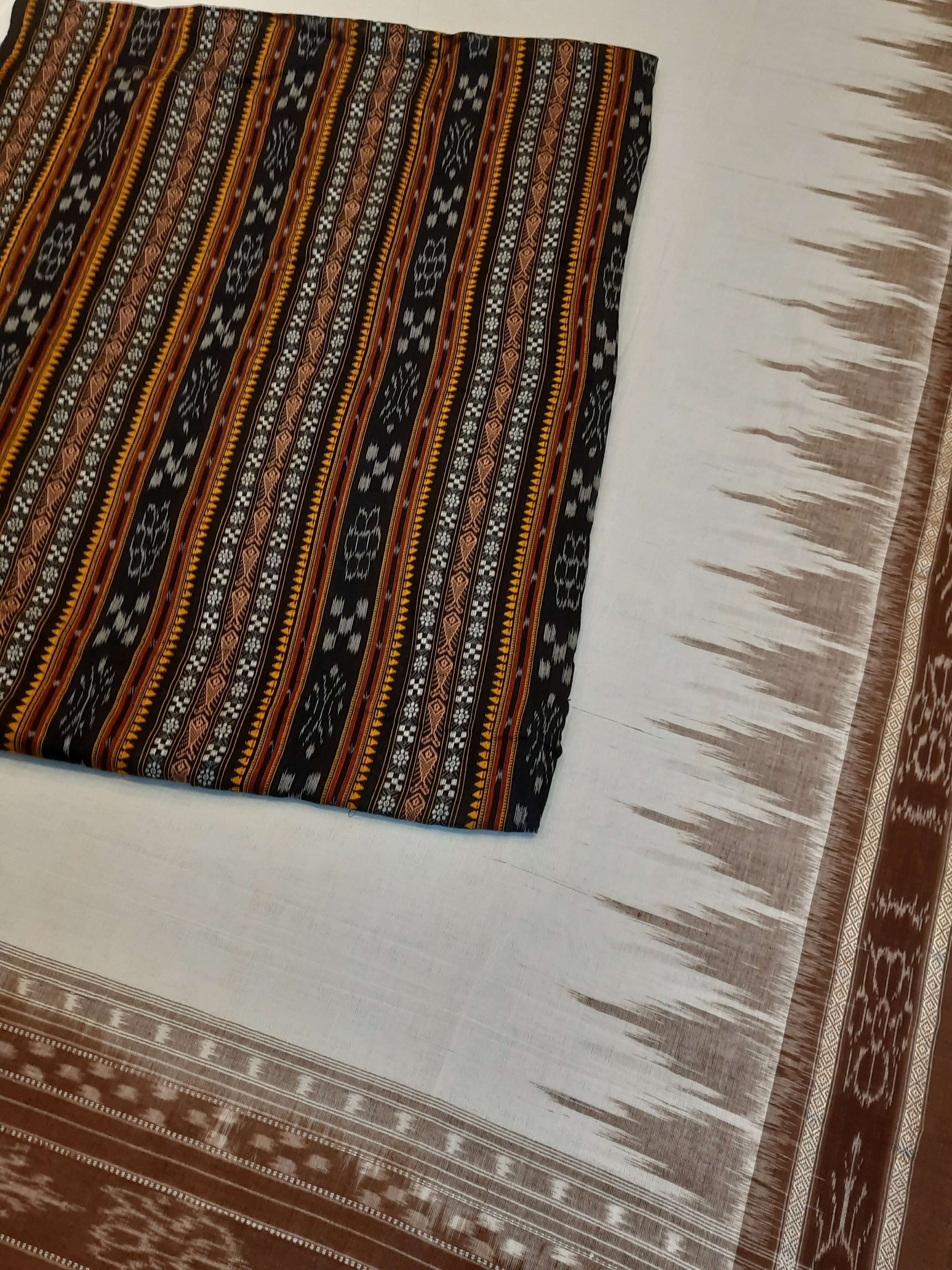 White and Brown coloured Odisha Ikat saree  with cotton ikat blouse piece