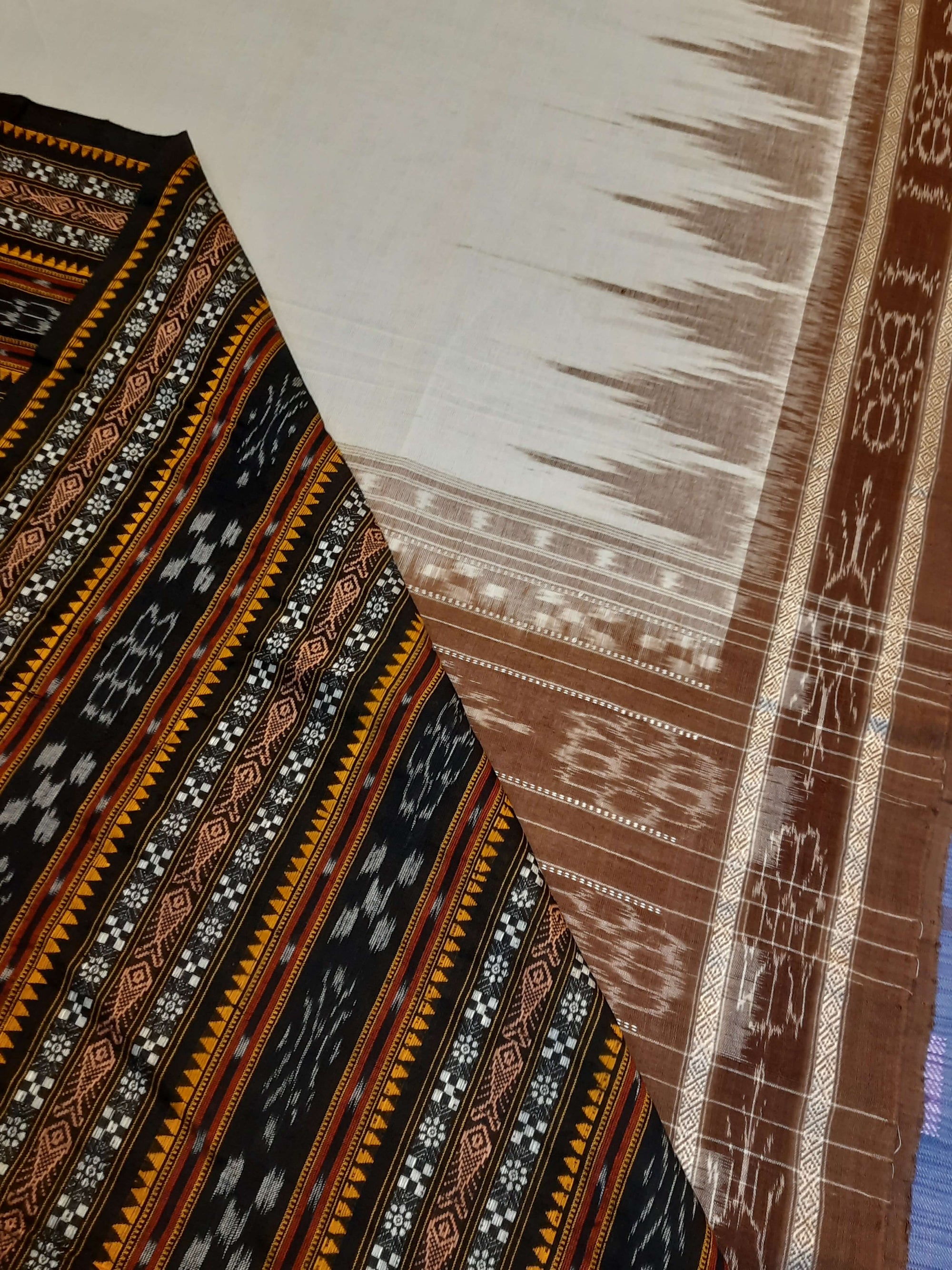 White and Brown coloured Odisha Ikat saree  with cotton ikat blouse piece