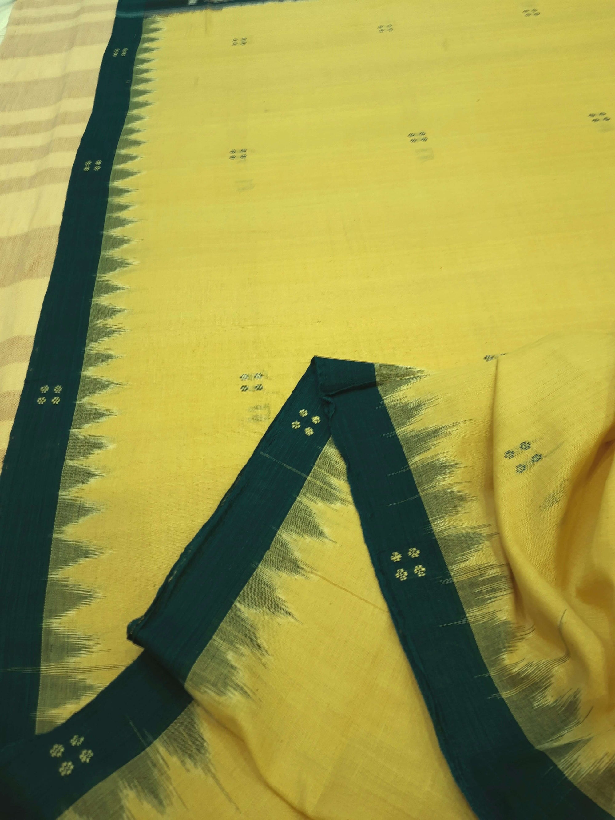 Yellow with Green coloured Odisha Ikat saree  with cotton ikat blouse piece