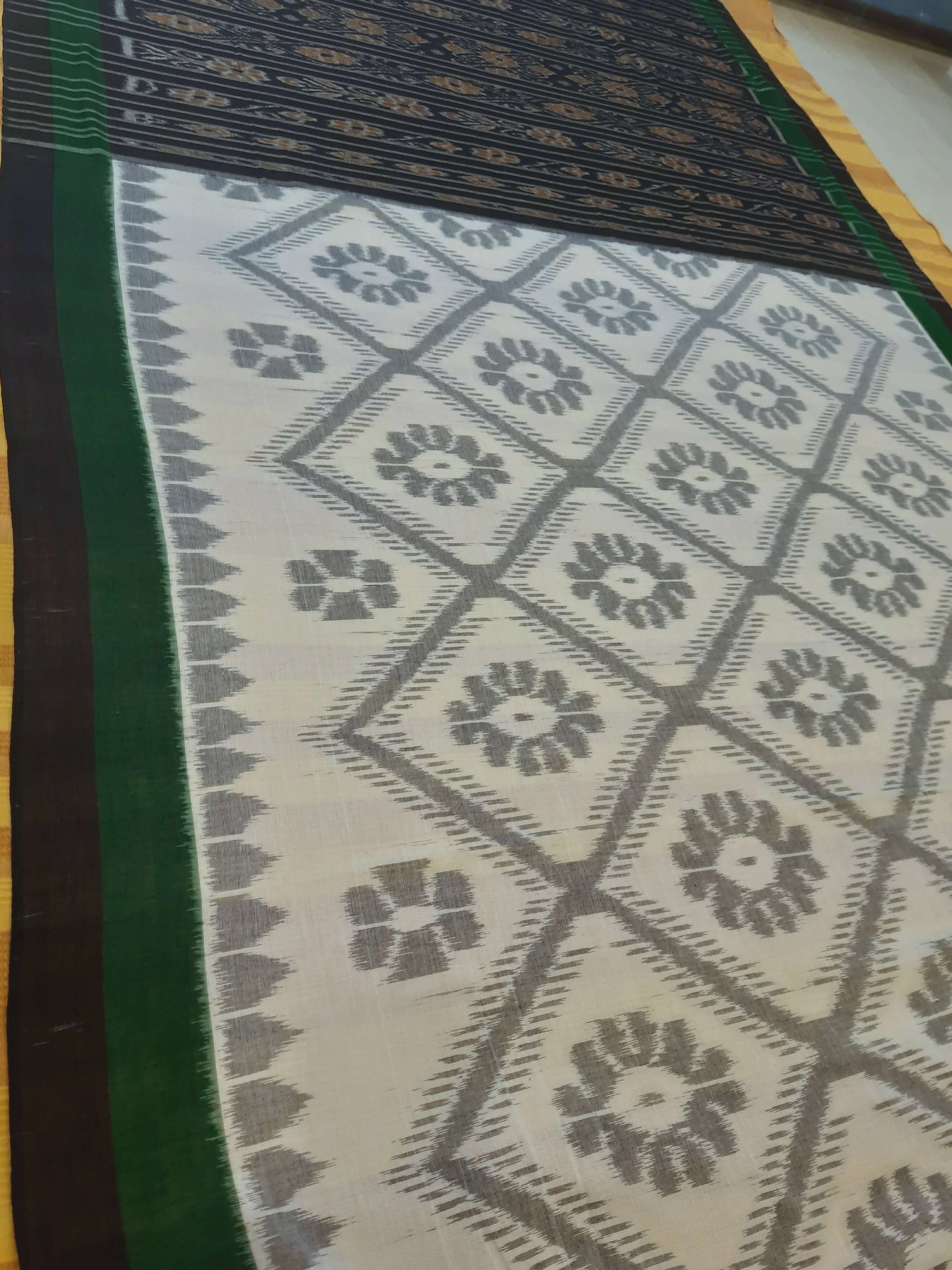 White and Green Cotton Odisha Ikat saree  with mix match cotton ikat blouse