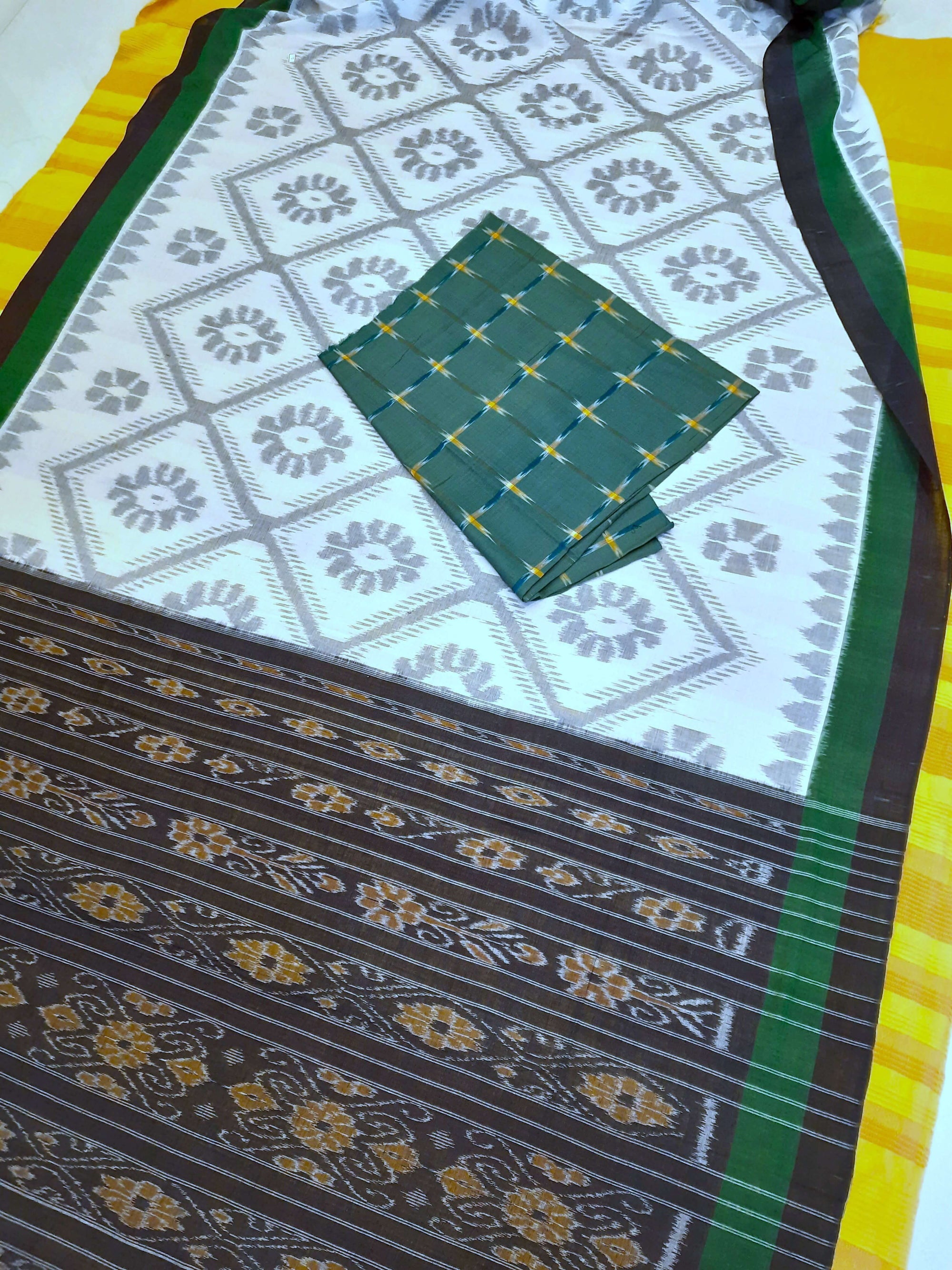 White and Green Cotton Odisha Ikat saree  with mix match cotton ikat blouse