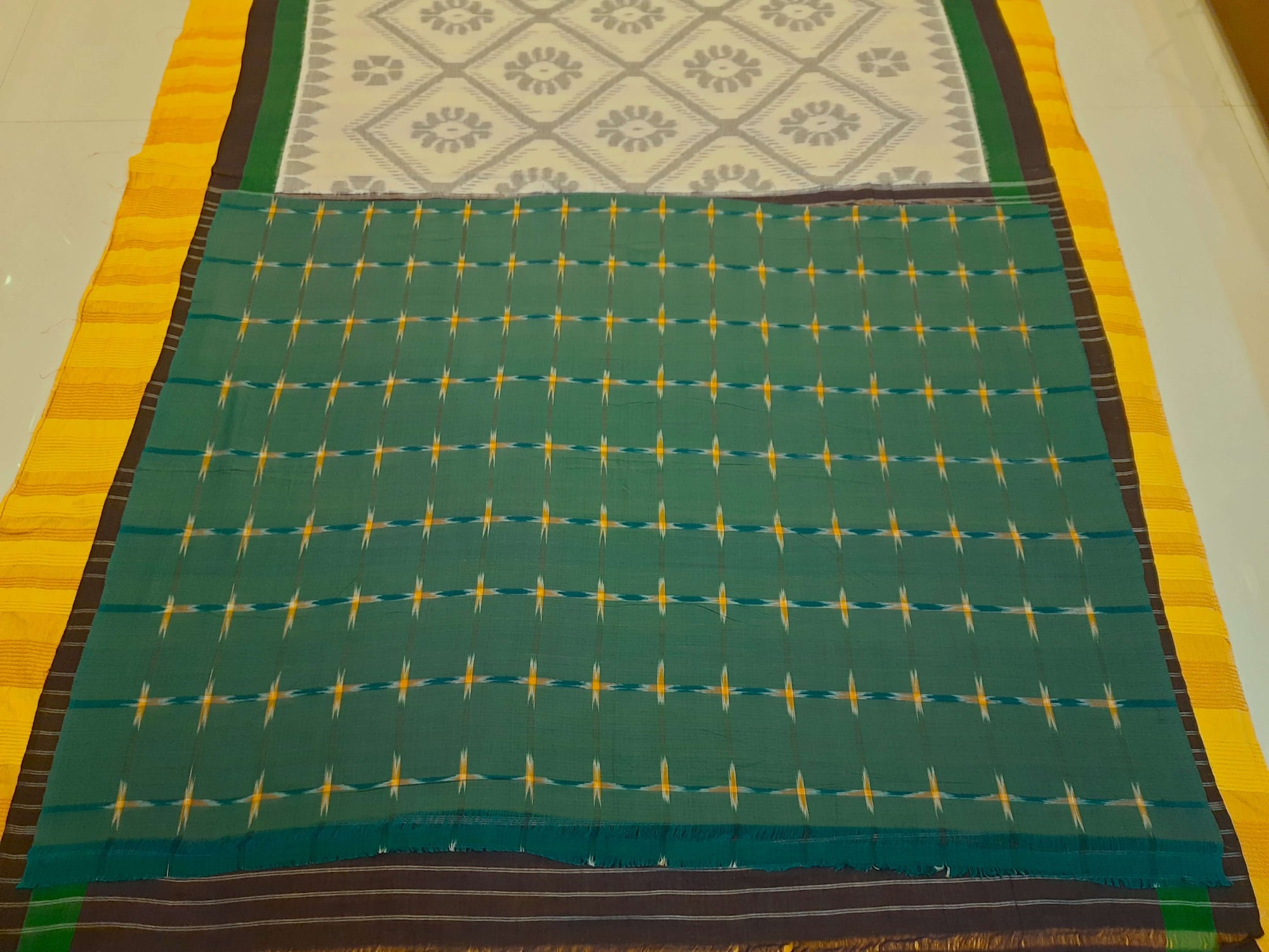 White and Green Cotton Odisha Ikat saree  with mix match cotton ikat blouse