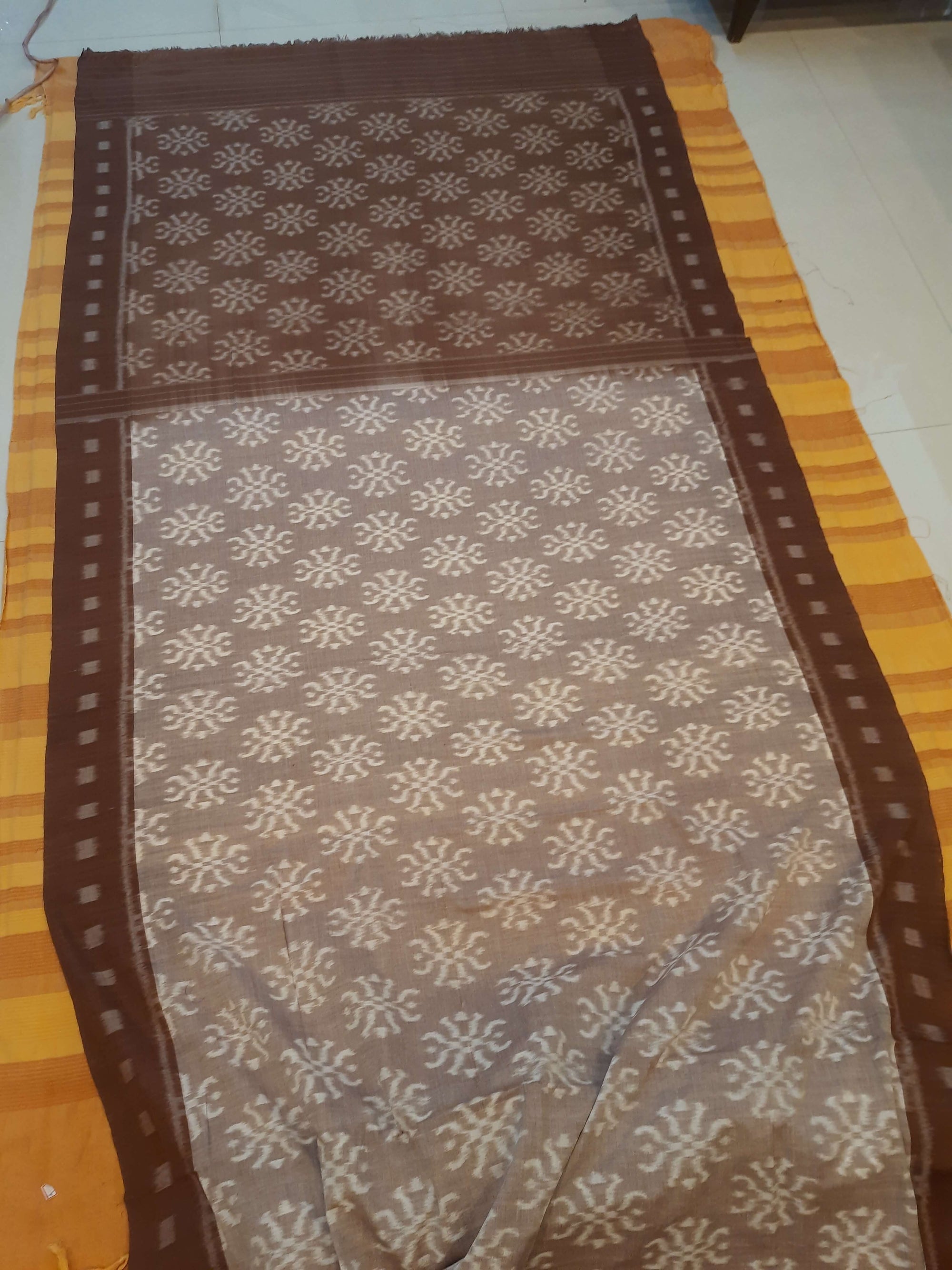 Brown Odisha Ikat saree with cotton ikat blouse piece