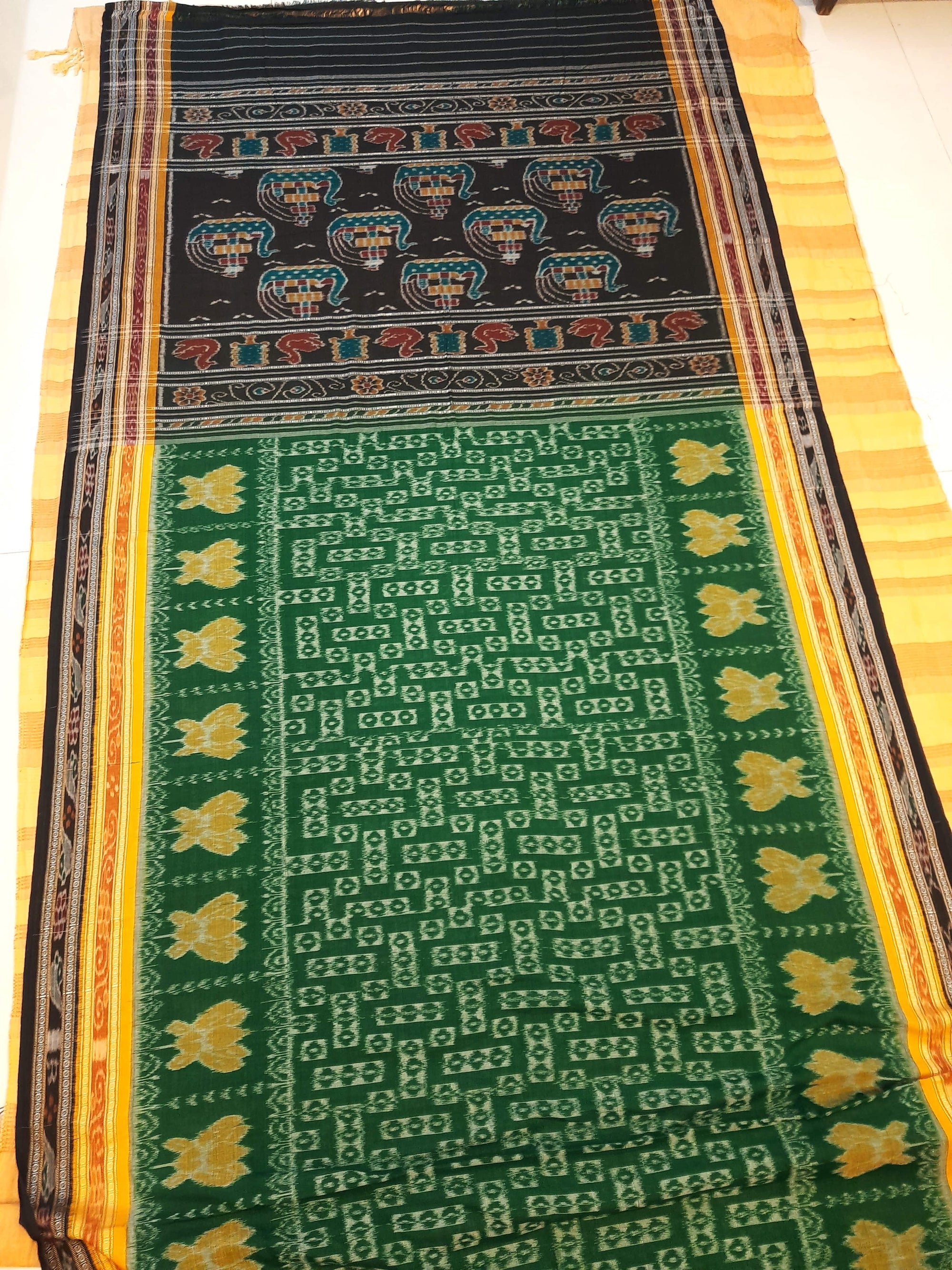 Green double border Odisha Ikat saree  with cotton ikat blouse piece