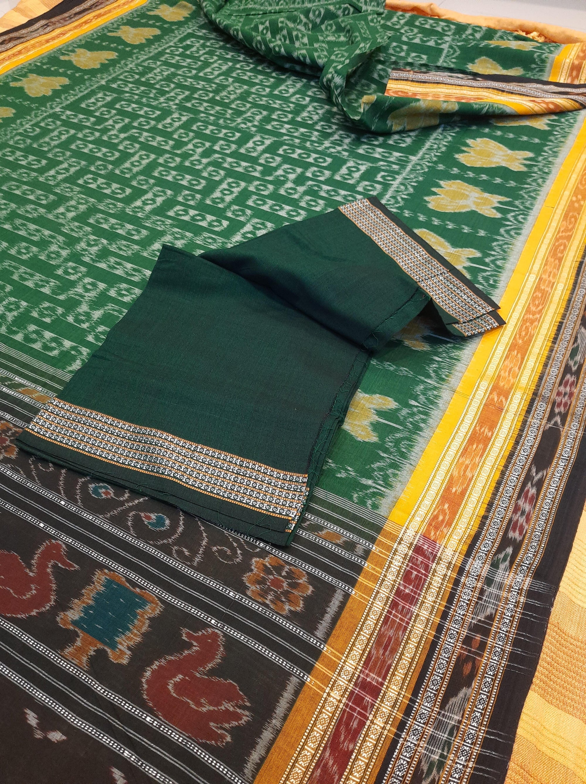 Green double border Odisha Ikat saree  with cotton ikat blouse piece