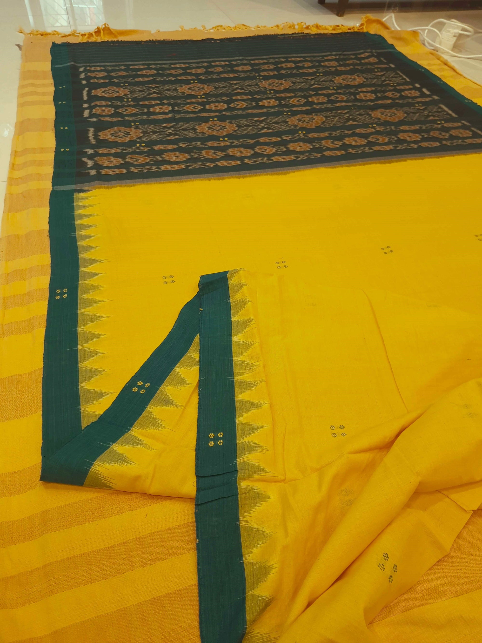 Yellow plain body Odisha Ikat saree  with cotton ikat blouse piece