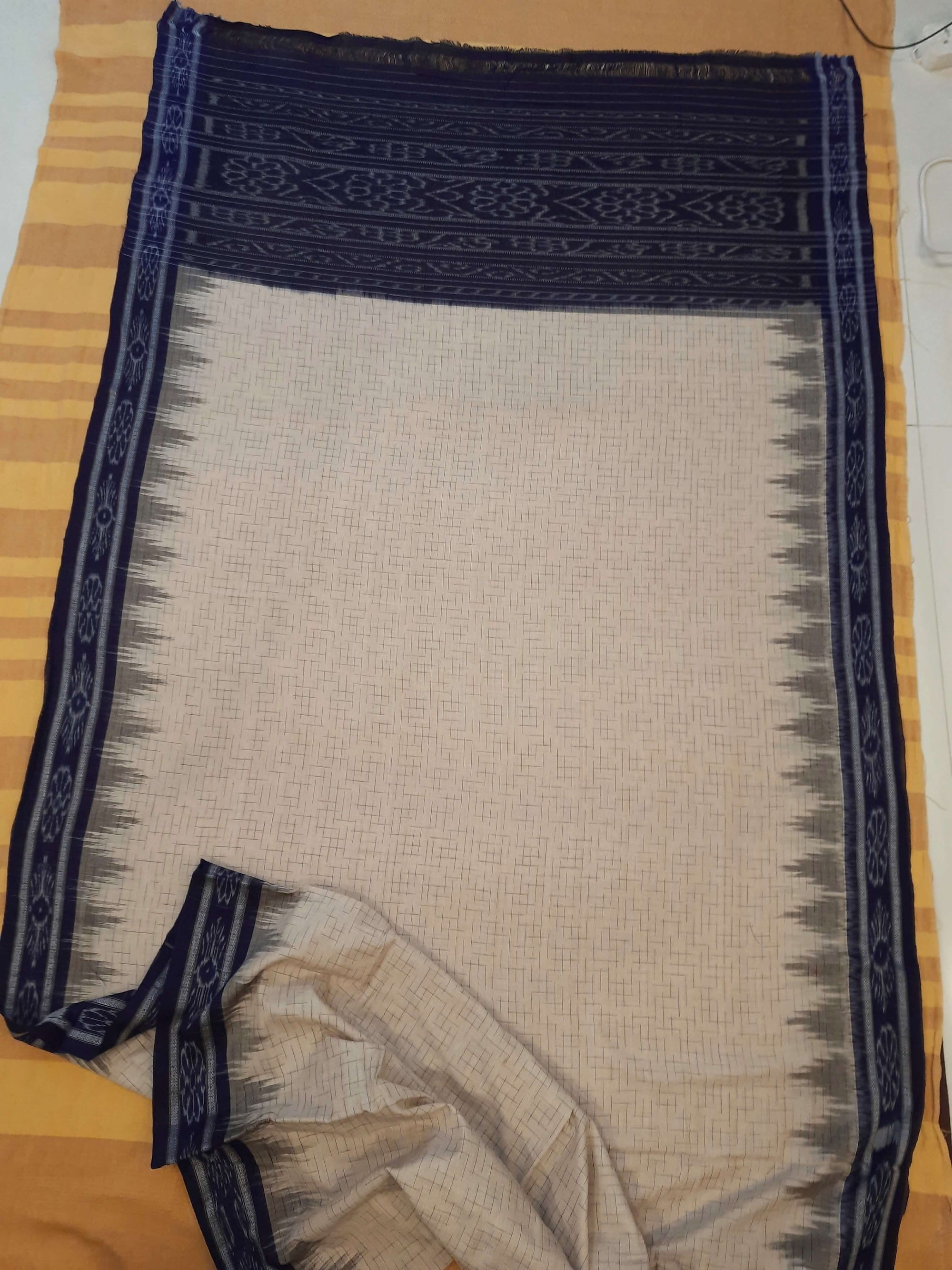 Beige Cotton Odisha Ikat saree with mix match Sambalpuri cotton ikat blouse