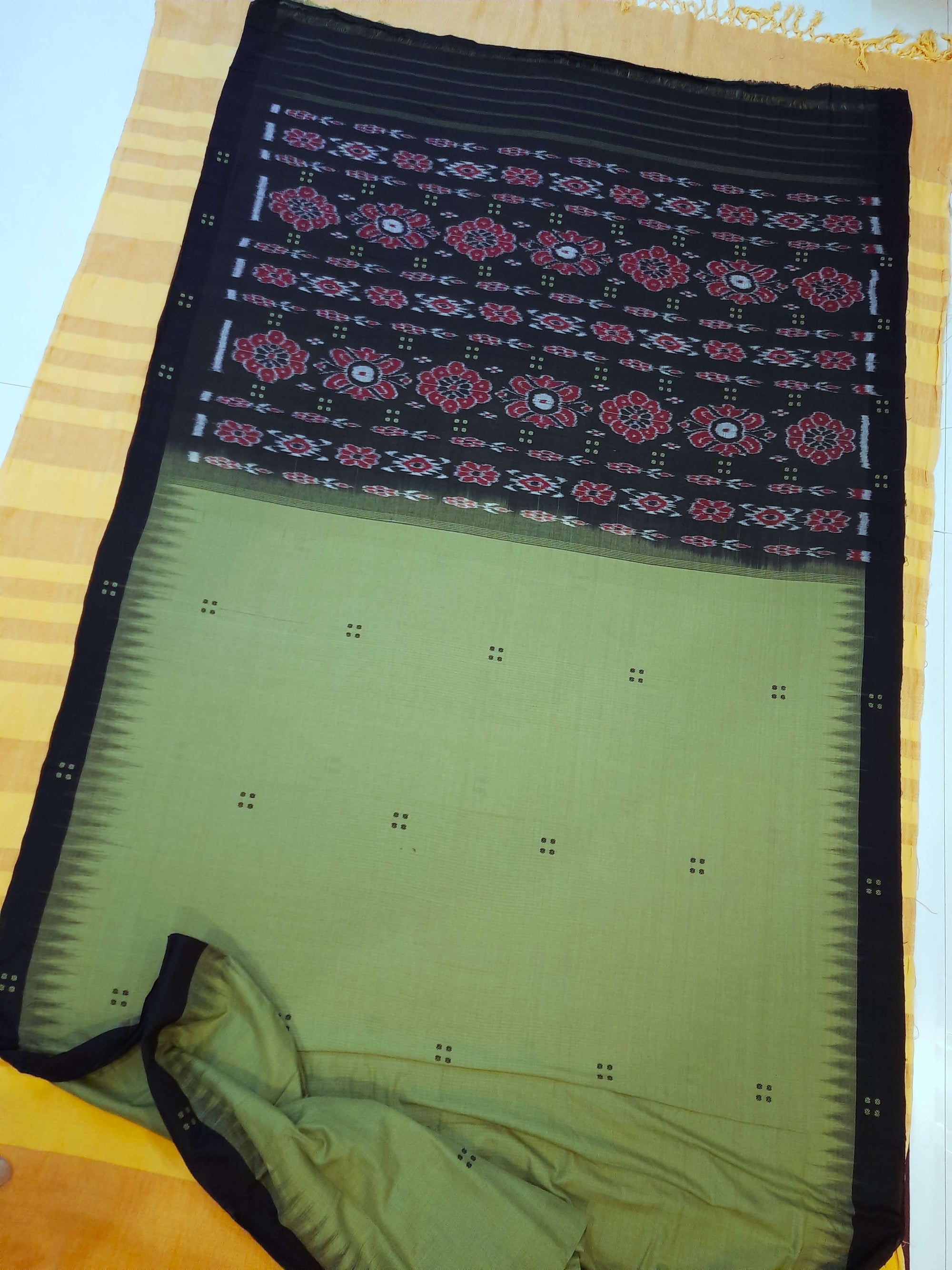 Green with black coloured Odisha Ikat saree  with cotton ikat blouse piece