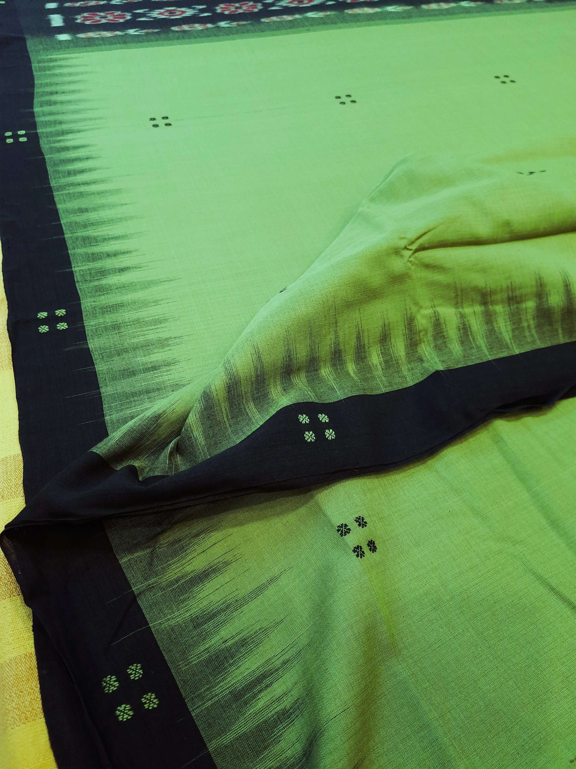 Green with black coloured Odisha Ikat saree  with cotton ikat blouse piece