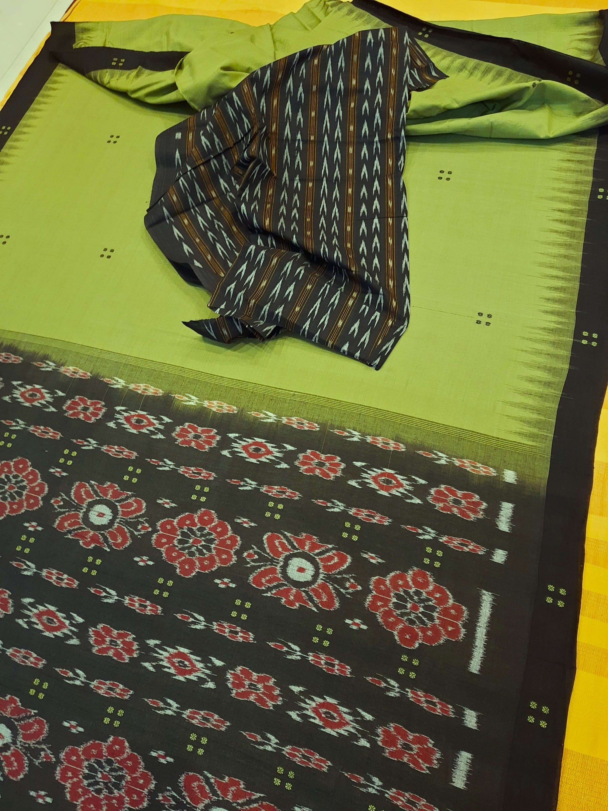 Green with black coloured Odisha Ikat saree  with cotton ikat blouse piece