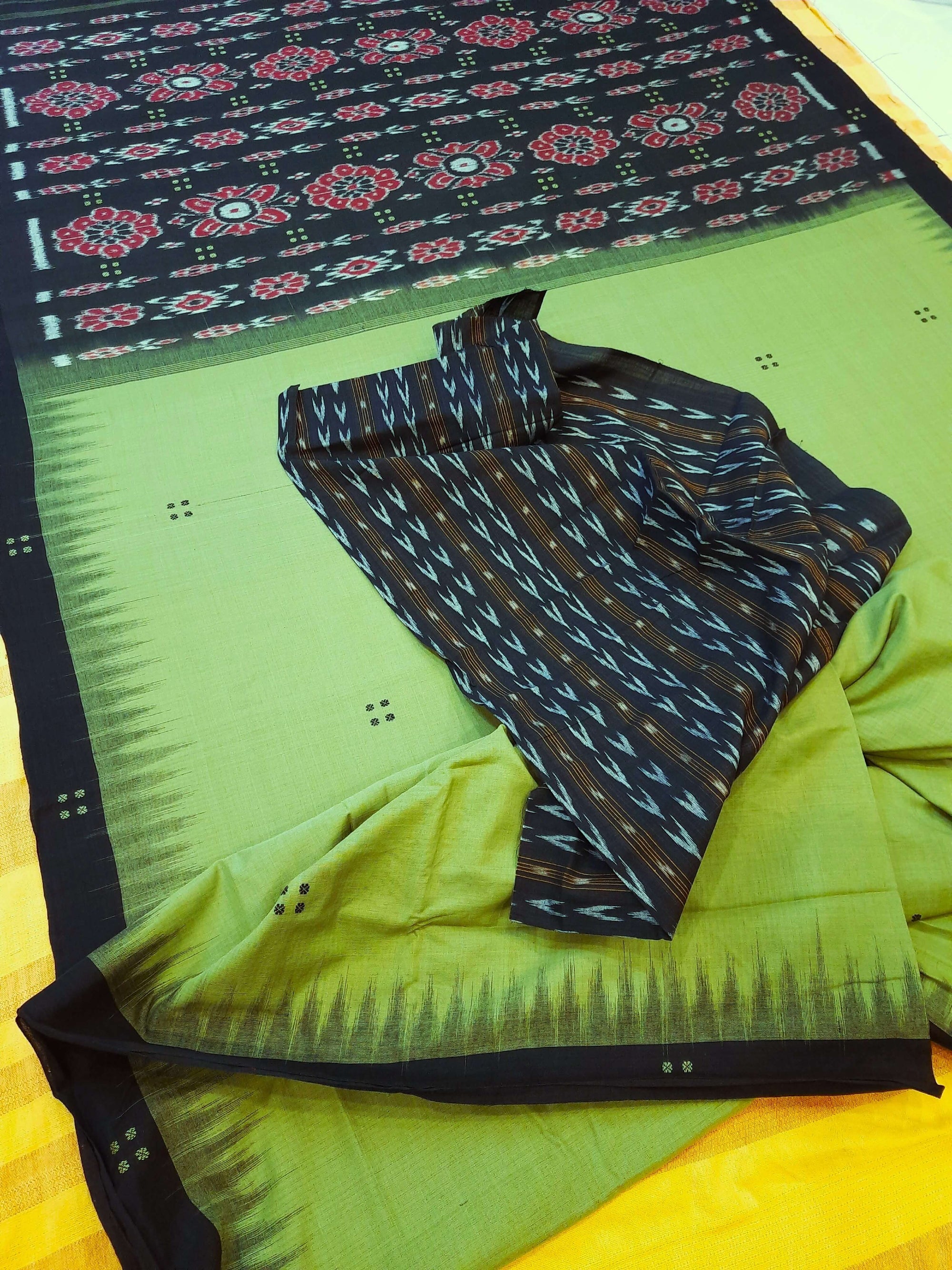Green with black coloured Odisha Ikat saree  with cotton ikat blouse piece