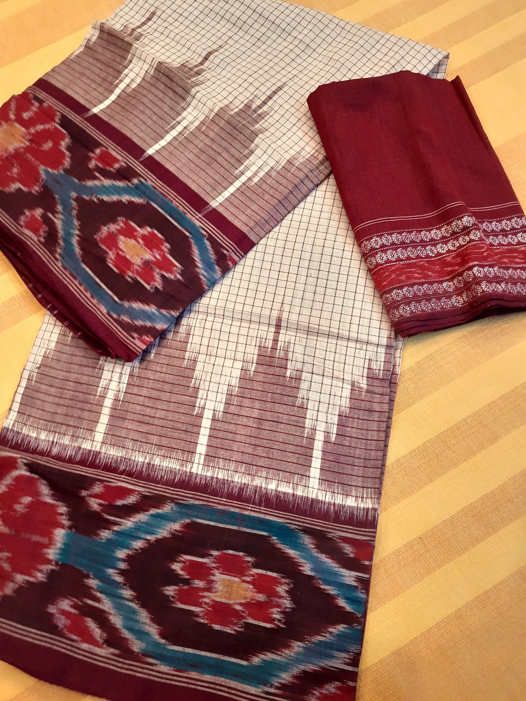Beige checked body Cotton Odisha Ikat saree with mix match cotton ikat blouse