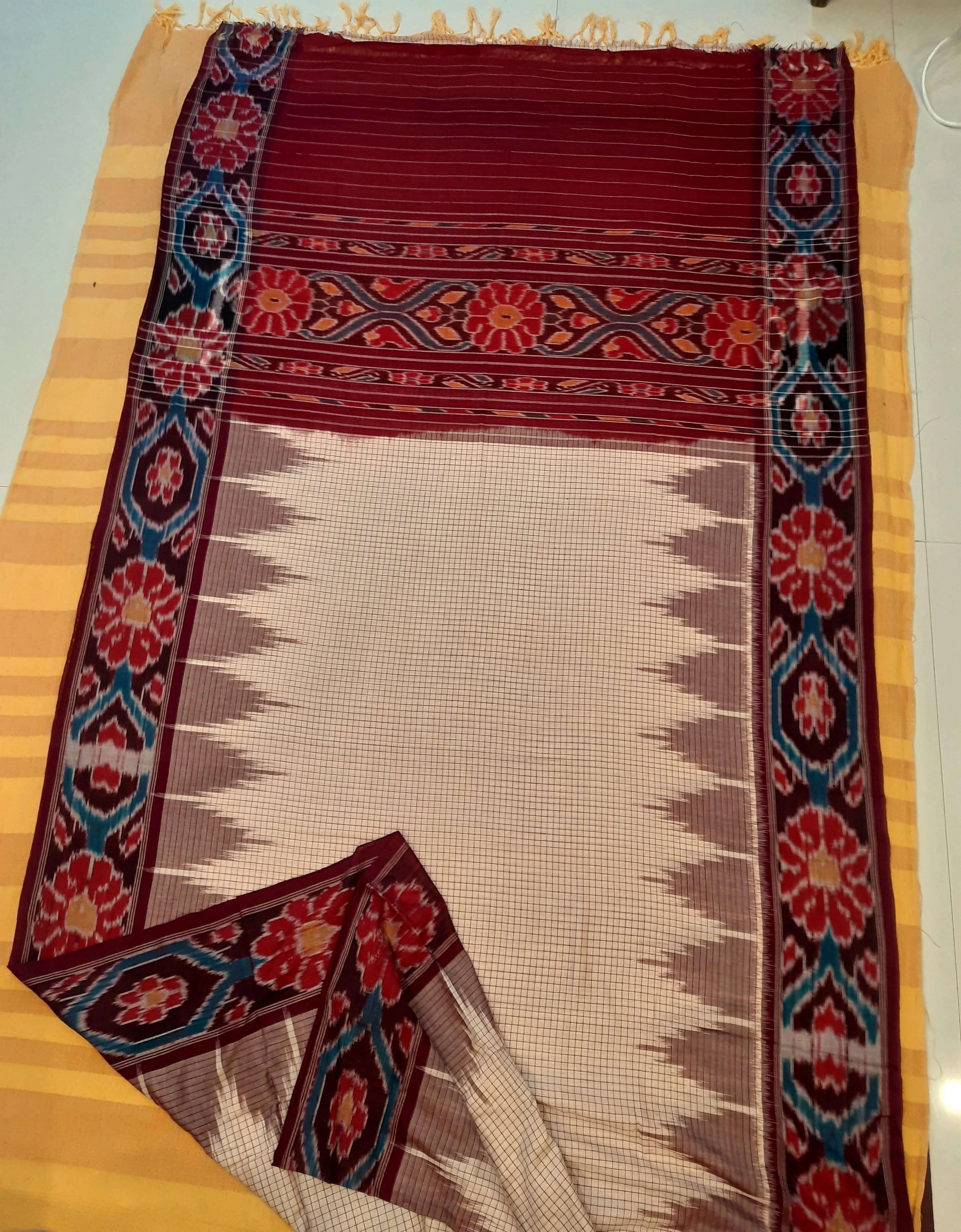 Beige checked body Cotton Odisha Ikat saree with mix match cotton ikat blouse