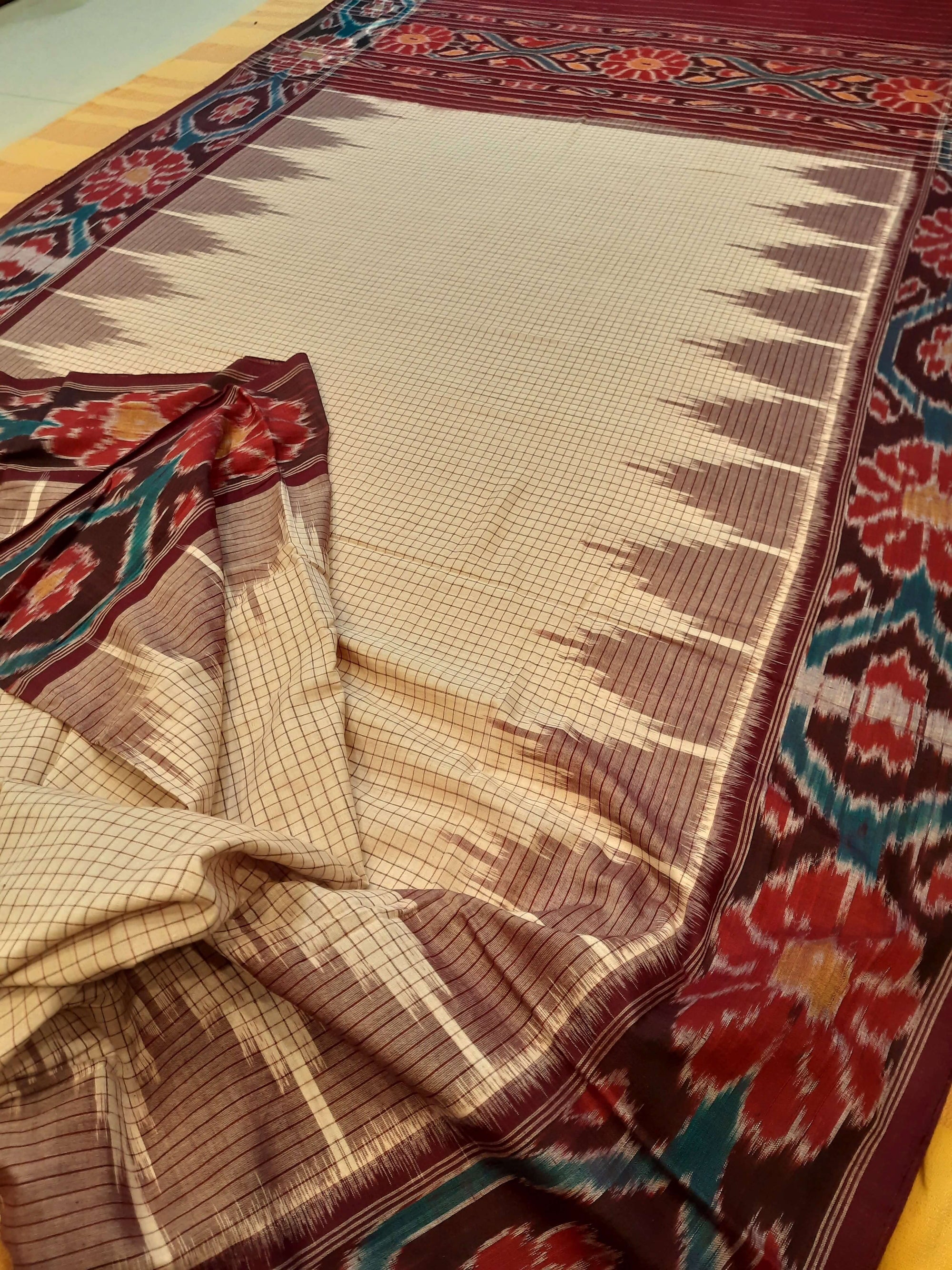 Beige checked body Cotton Odisha Ikat saree with mix match cotton ikat blouse