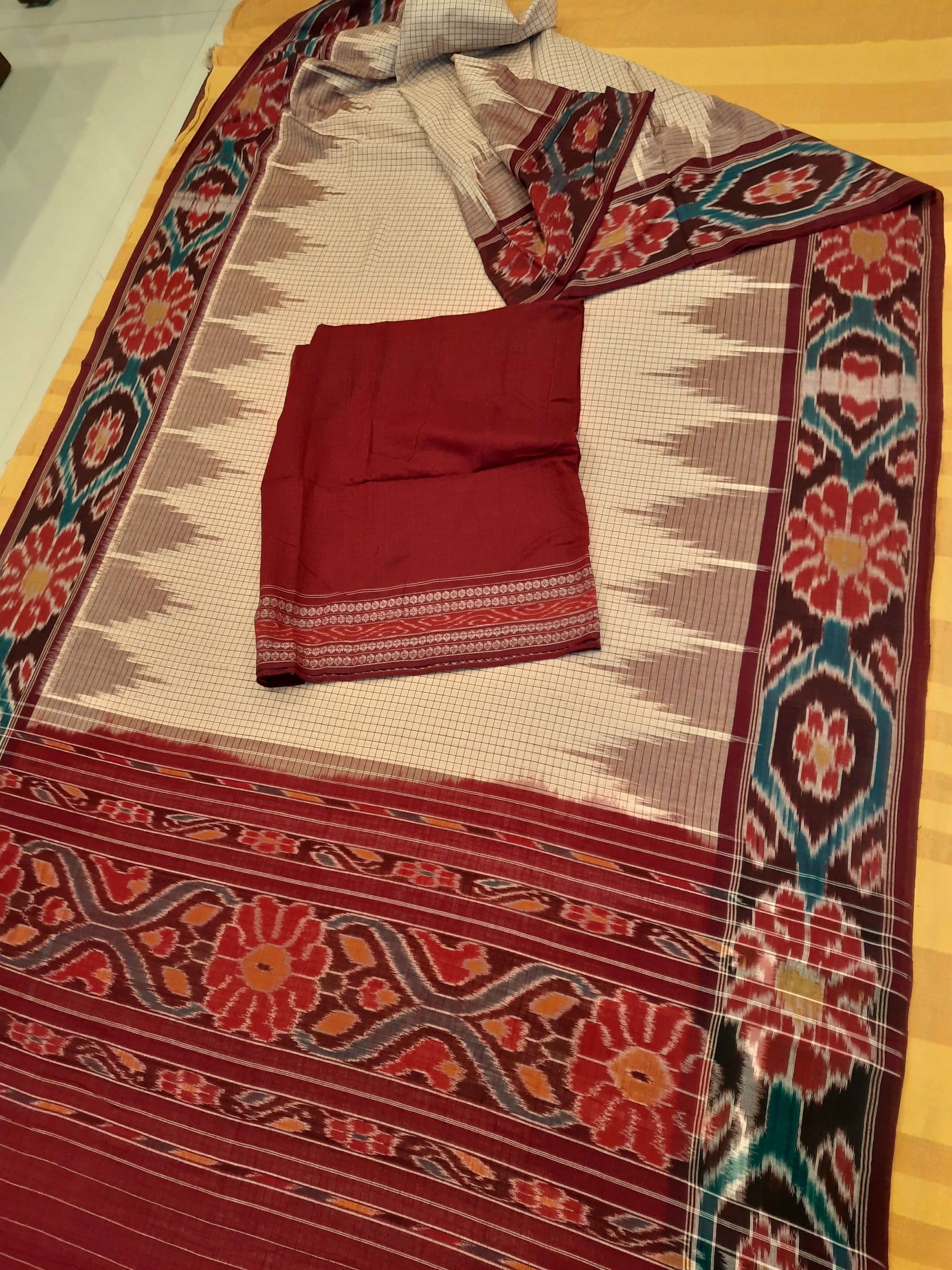 Beige checked body Cotton Odisha Ikat saree with mix match cotton ikat blouse
