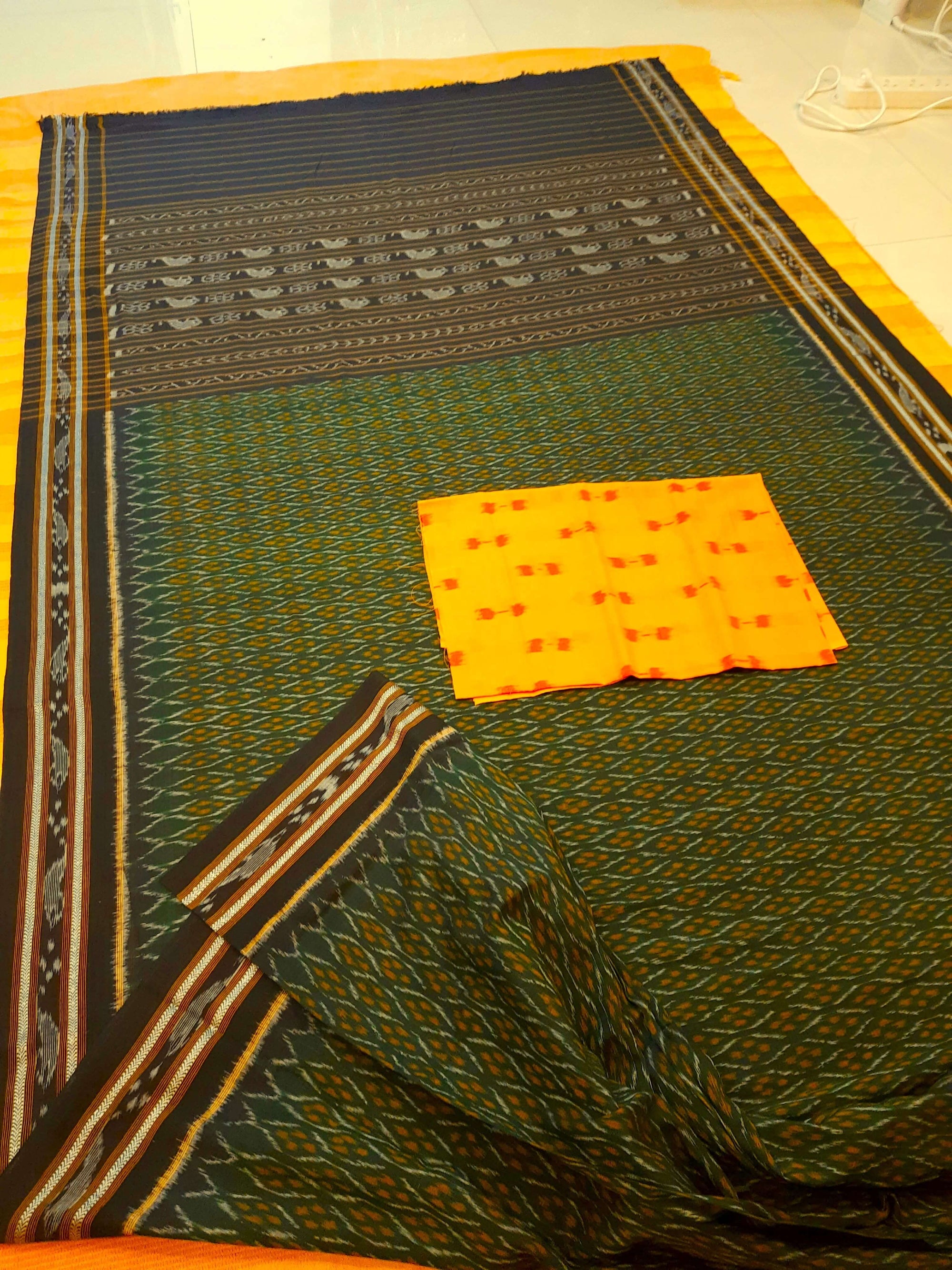 Green Cotton Odisha Ikat saree with mix match cotton ikat blouse piece