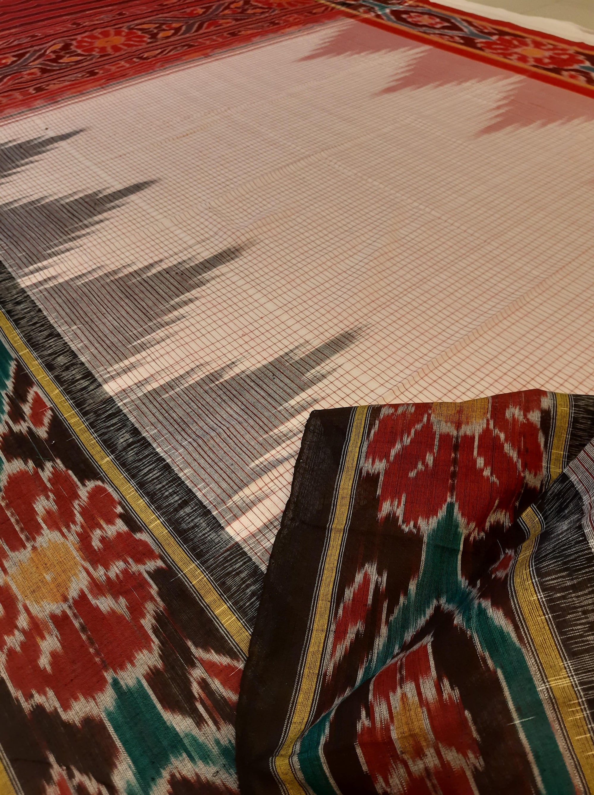 Beige checked body Cotton Odisha Ikat saree with mix match cotton ikat blouse