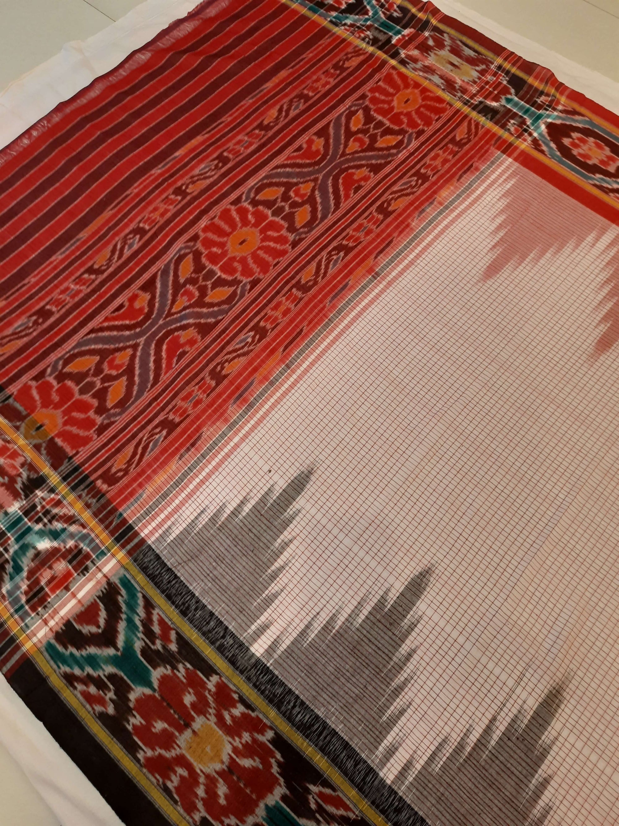 Beige checked body Cotton Odisha Ikat saree with mix match cotton ikat blouse