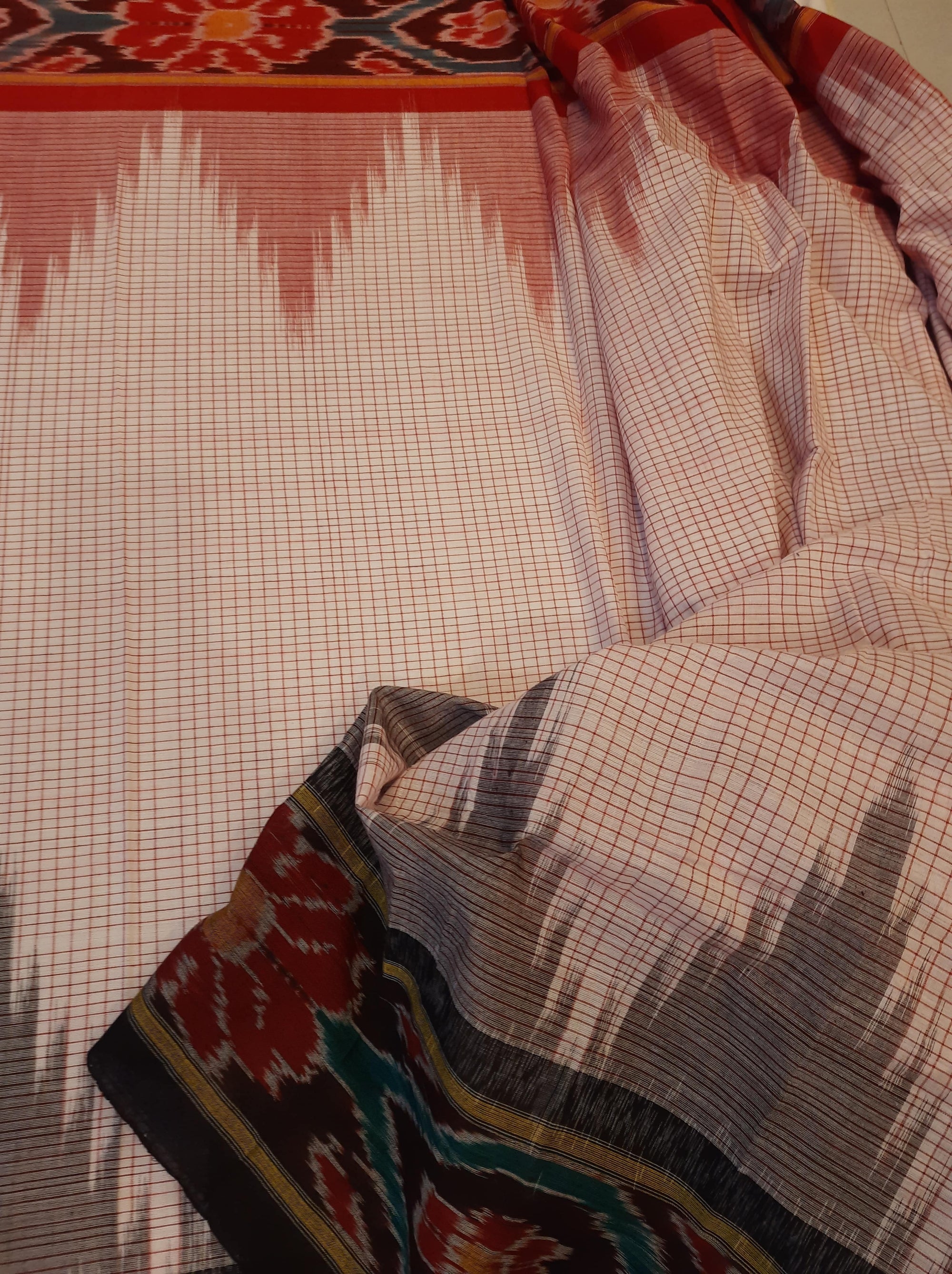 Beige checked body Cotton Odisha Ikat saree with mix match cotton ikat blouse