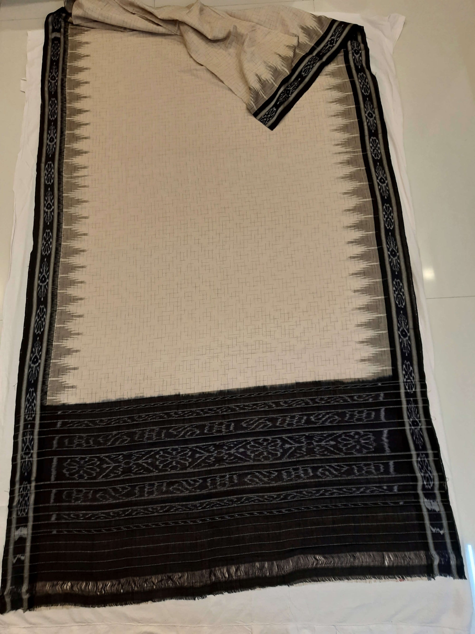 Beige Cotton Odisha Ikat saree with mix match cotton ikat blouse piece