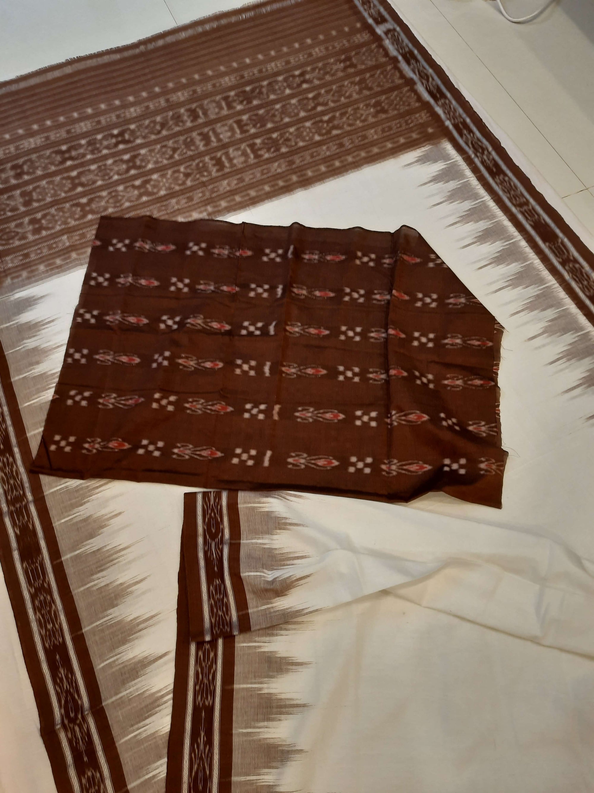 White and Brown coloured Odisha Ikat saree  with cotton ikat blouse piece