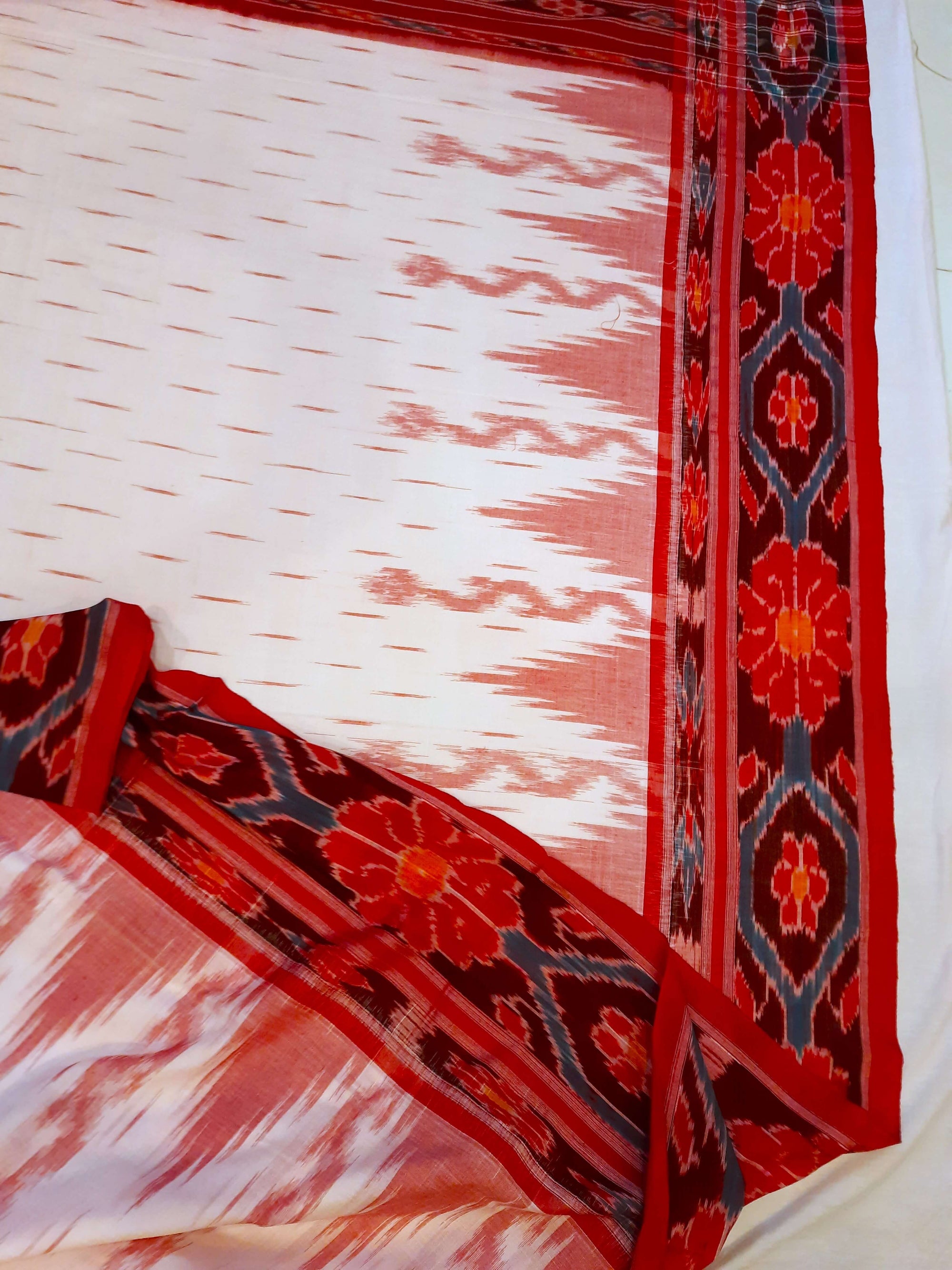 White with Red Cotton Odisha Ikat saree with cotton ikat blouse piece