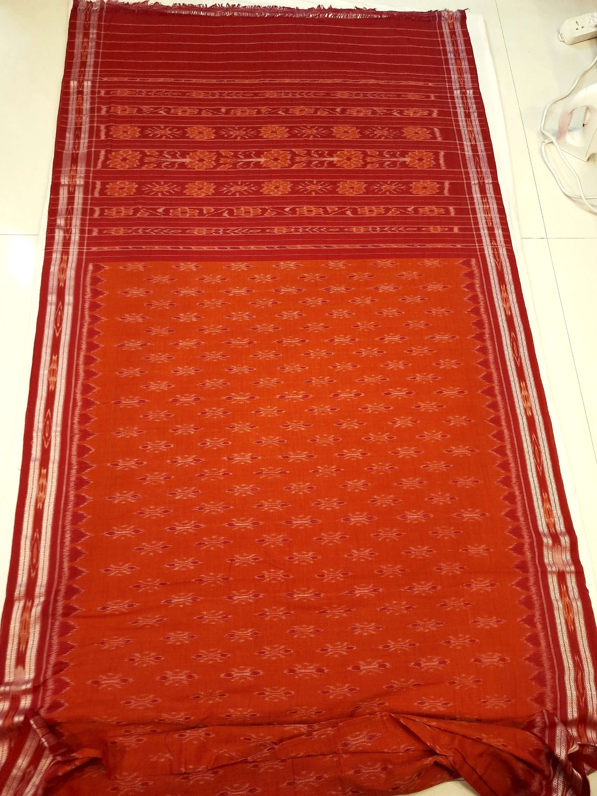 Orange with Red Cotton Odisha Ikat saree with cotton ikat blouse piece