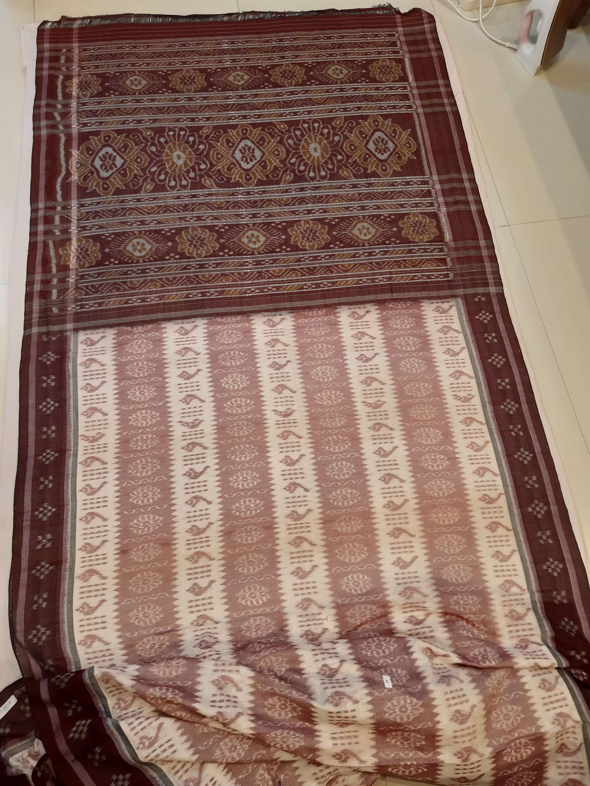 Offwhite Maroon Odisha Ikat saree with cotton ikat blouse piece