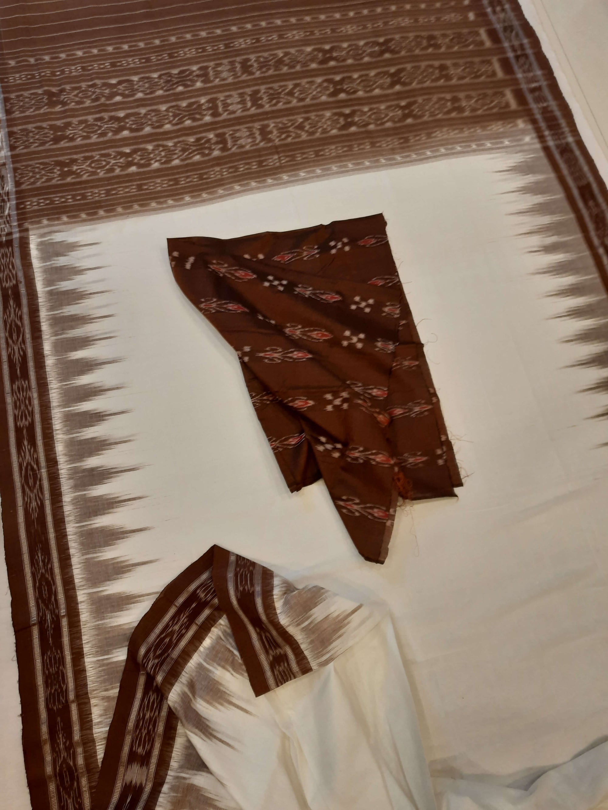 White and Brown coloured Odisha Ikat saree  with cotton ikat blouse piece