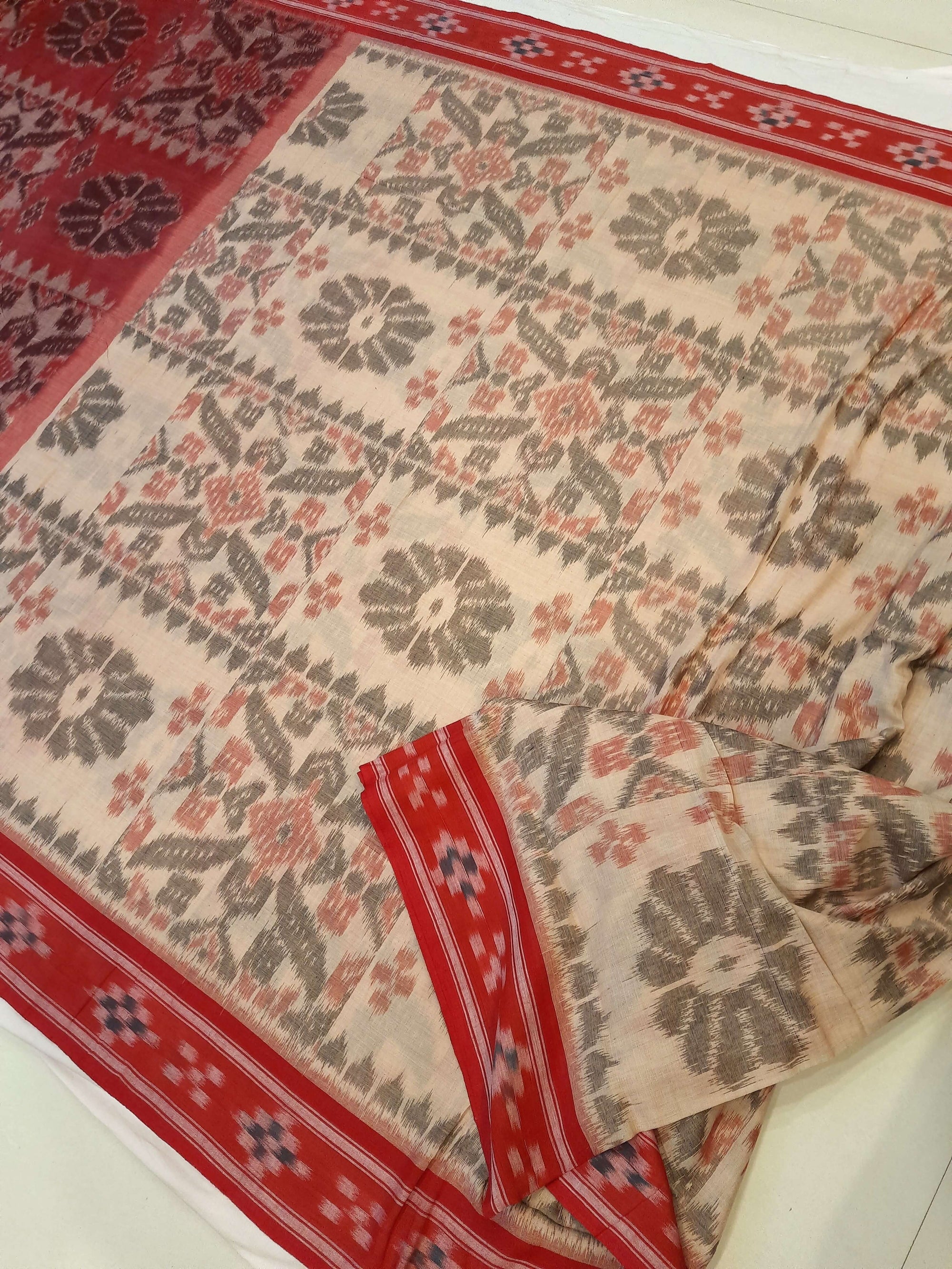 Beige and Red coloured Odisha Ikat saree  with cotton ikat blouse piece