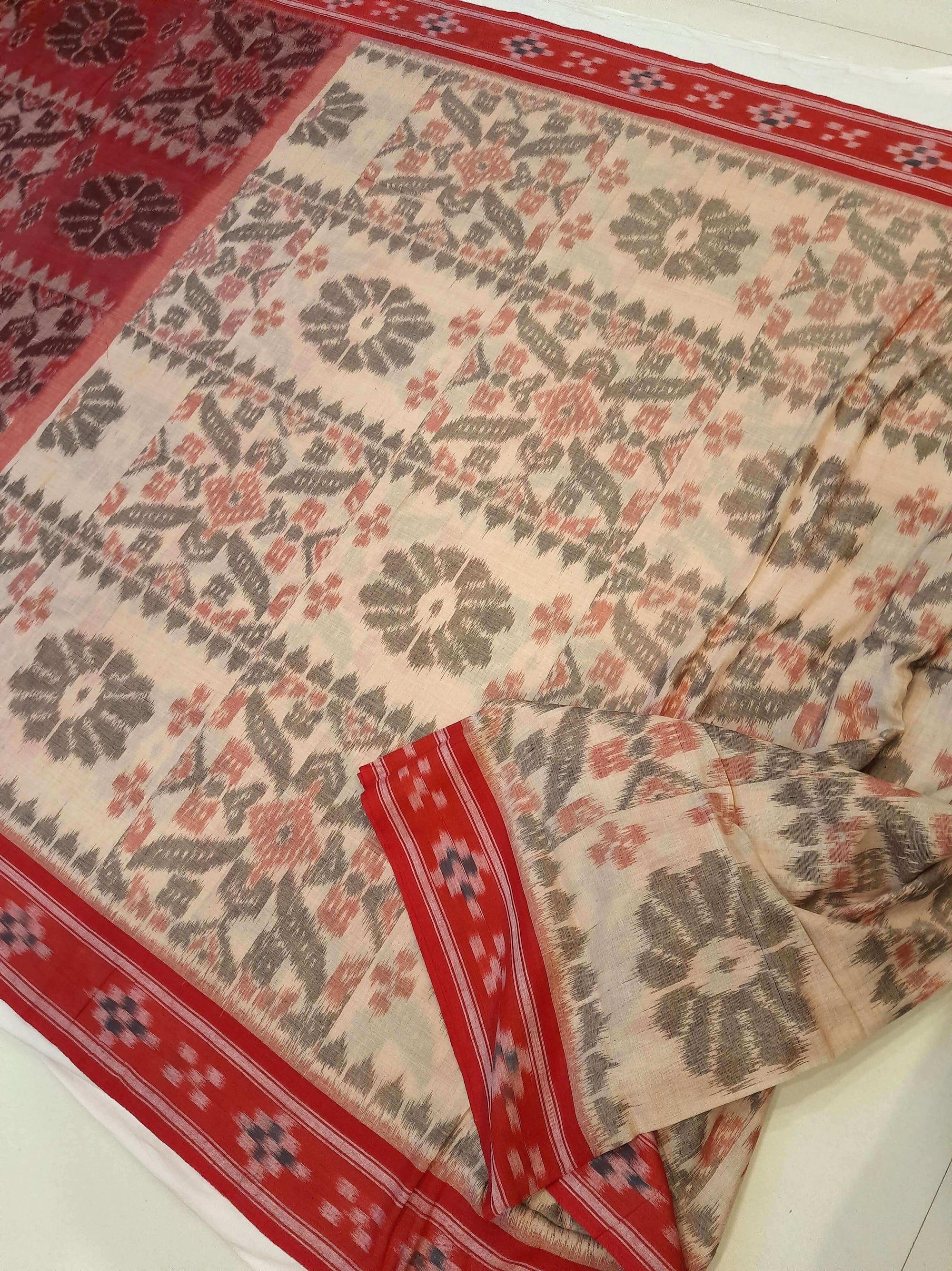 Beige and Red coloured Odisha Ikat saree  with cotton ikat blouse piece
