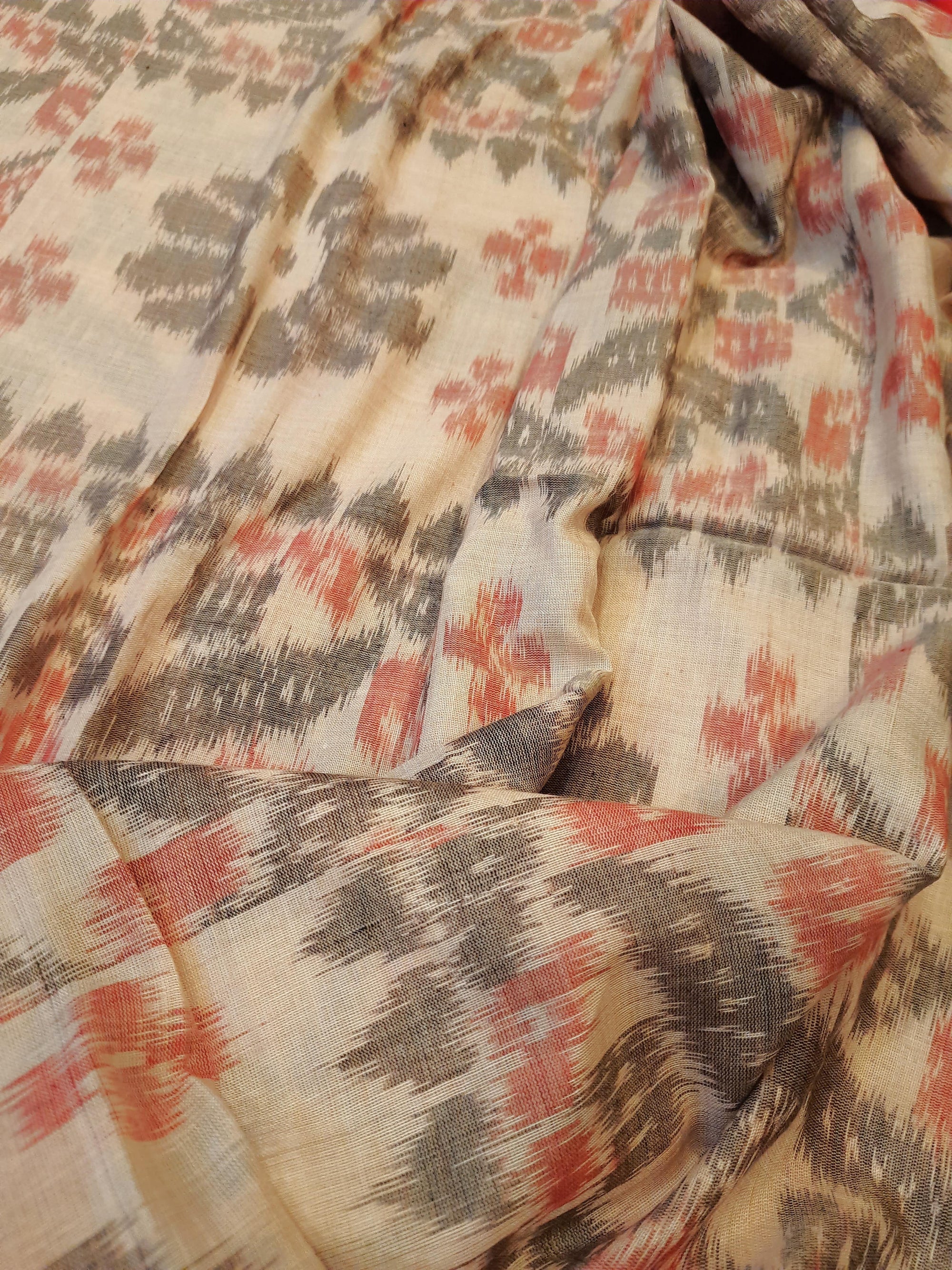 Beige and Red coloured Odisha Ikat saree  with cotton ikat blouse piece
