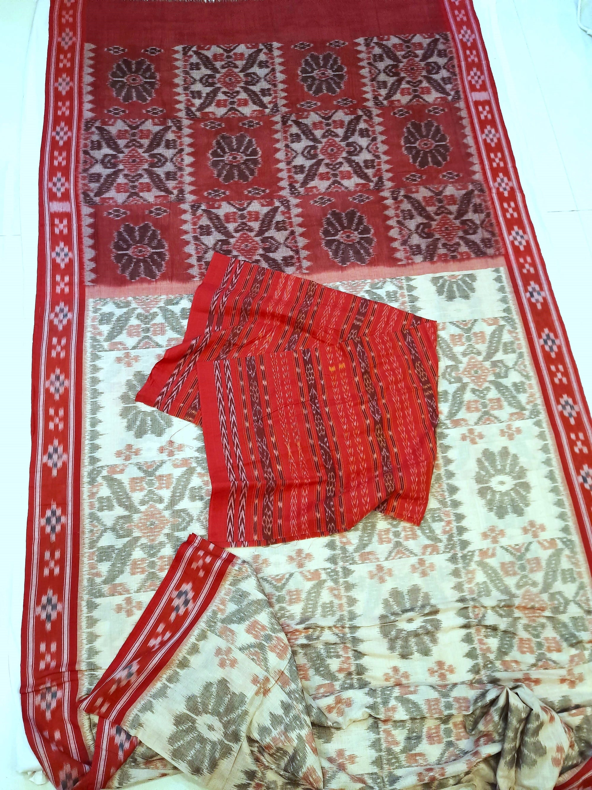 Beige and Red coloured Odisha Ikat saree  with cotton ikat blouse piece