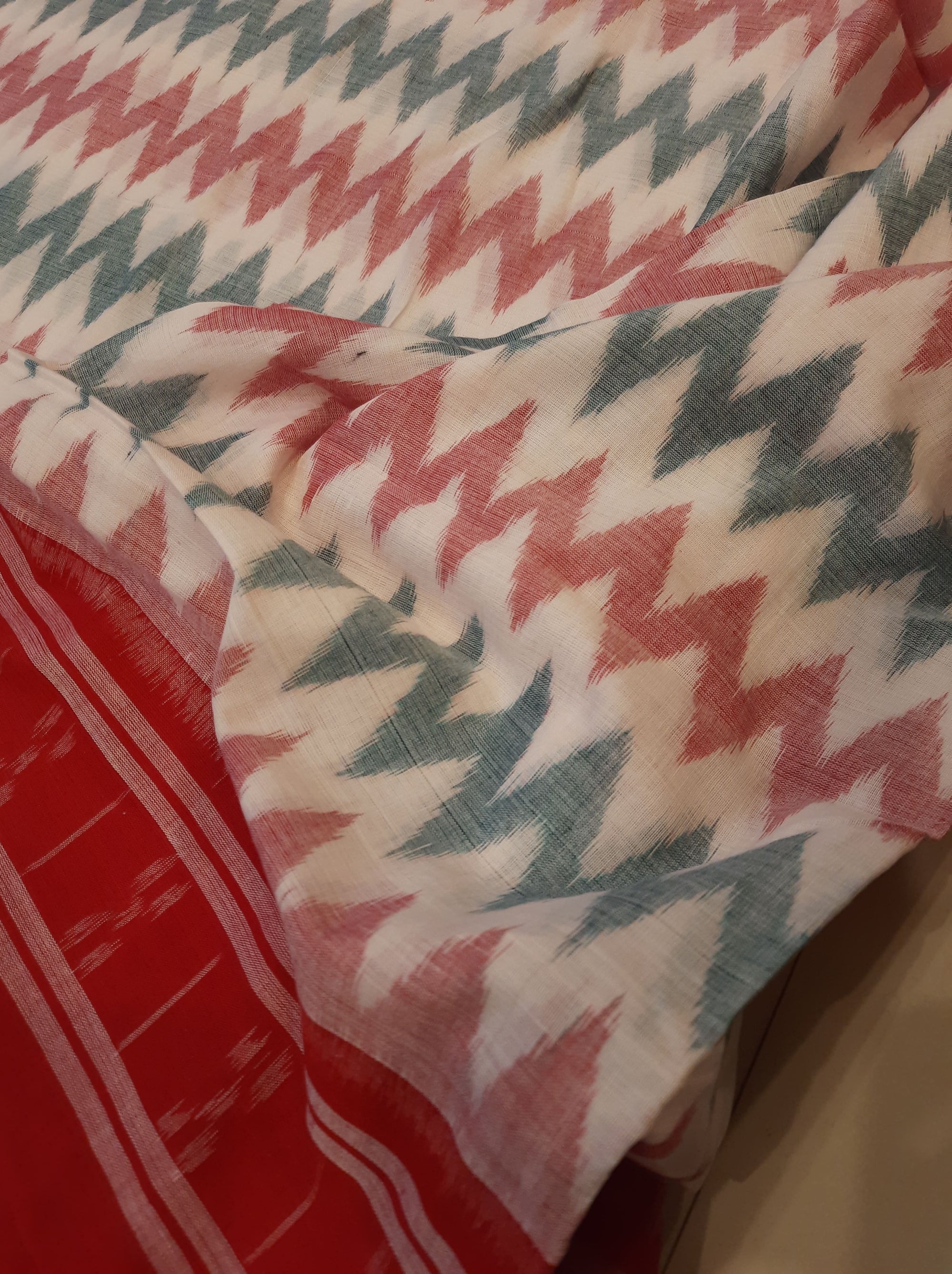 White with Red Green Cotton Odisha Ikat saree with cotton ikat blouse piece