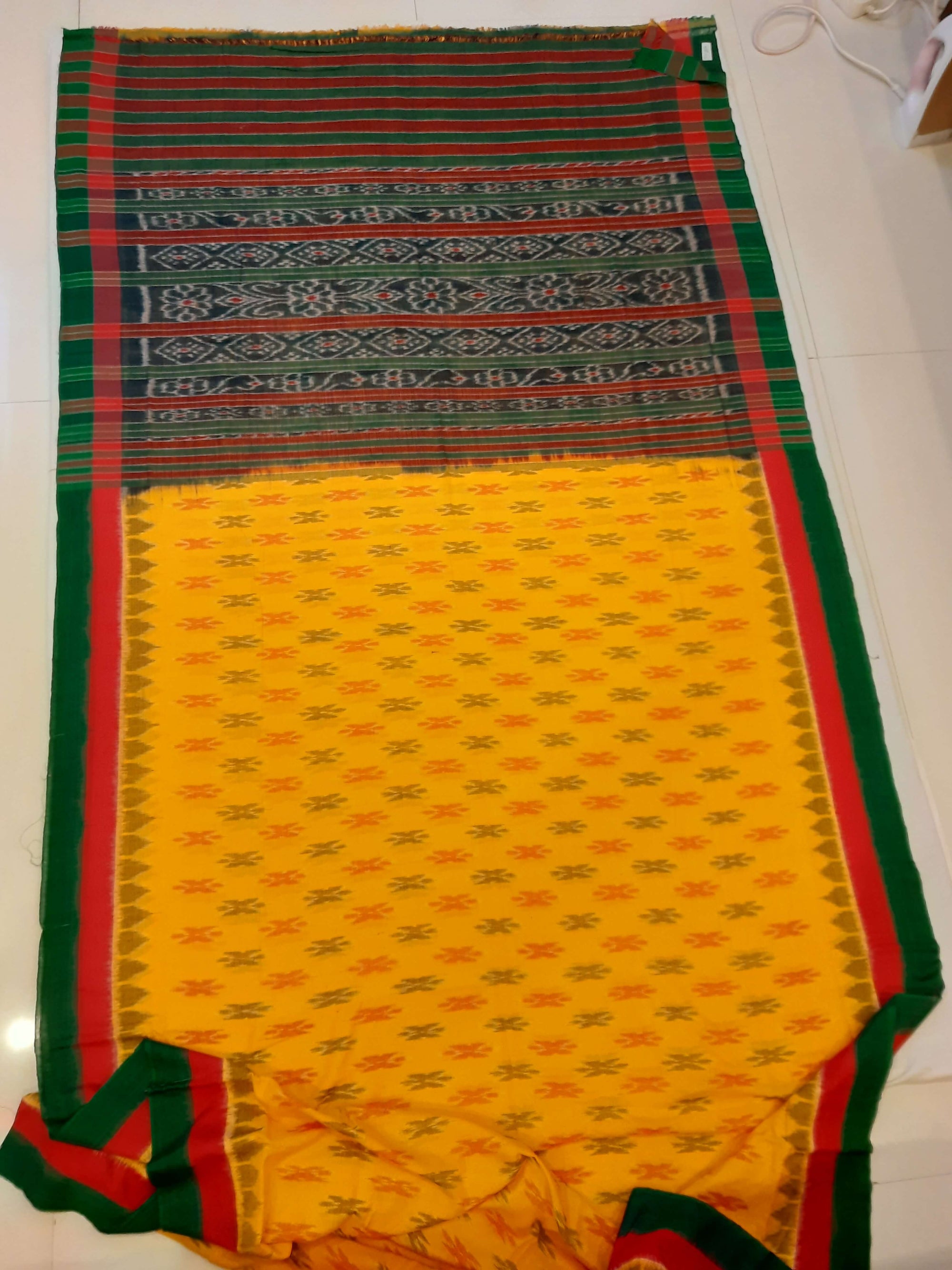 Yellow Cotton Odisha Ikat saree with cotton ikat blouse piece