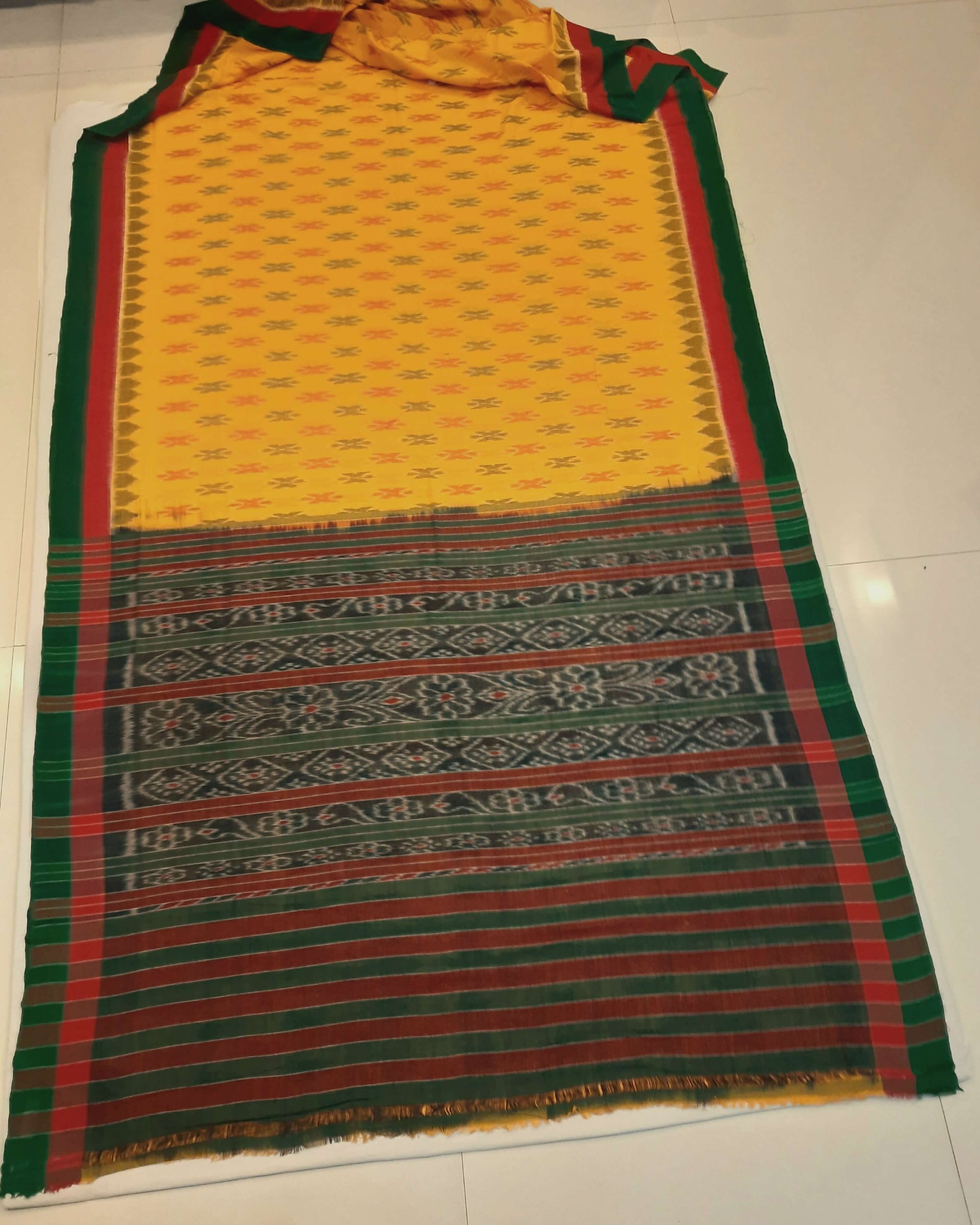 Yellow Cotton Odisha Ikat saree with cotton ikat blouse piece