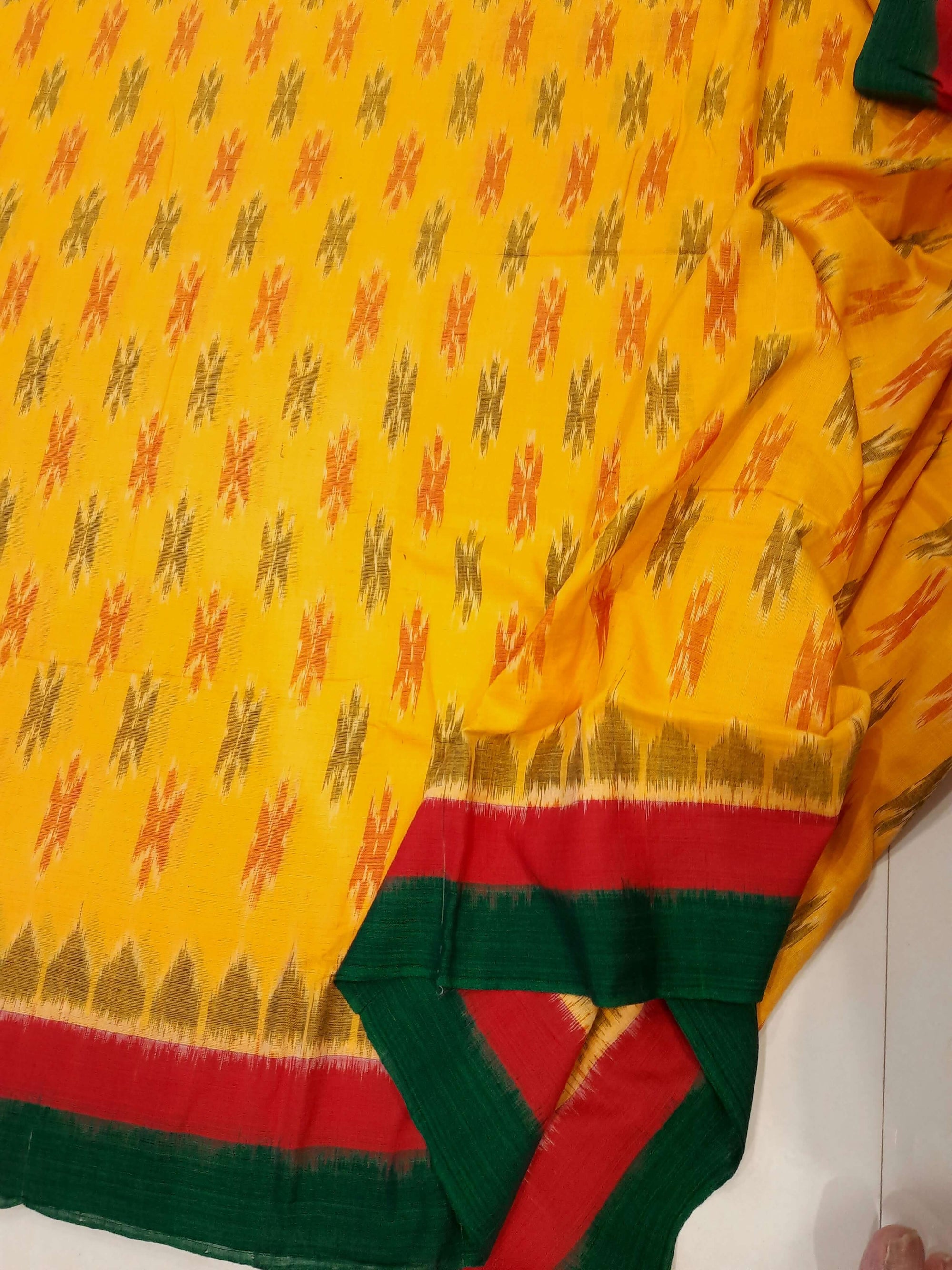 Yellow Cotton Odisha Ikat saree with cotton ikat blouse piece