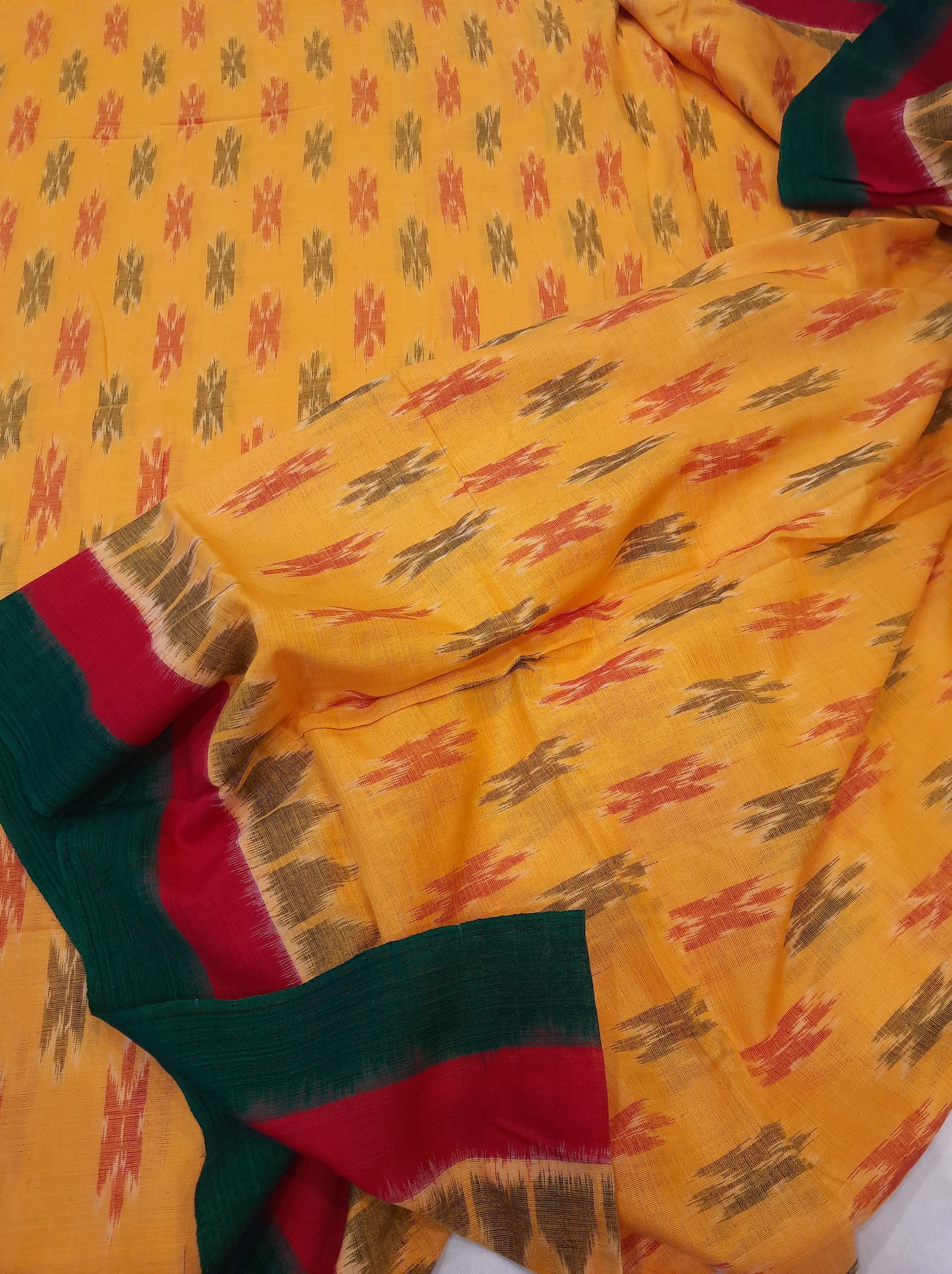 Yellow Cotton Odisha Ikat saree with cotton ikat blouse piece
