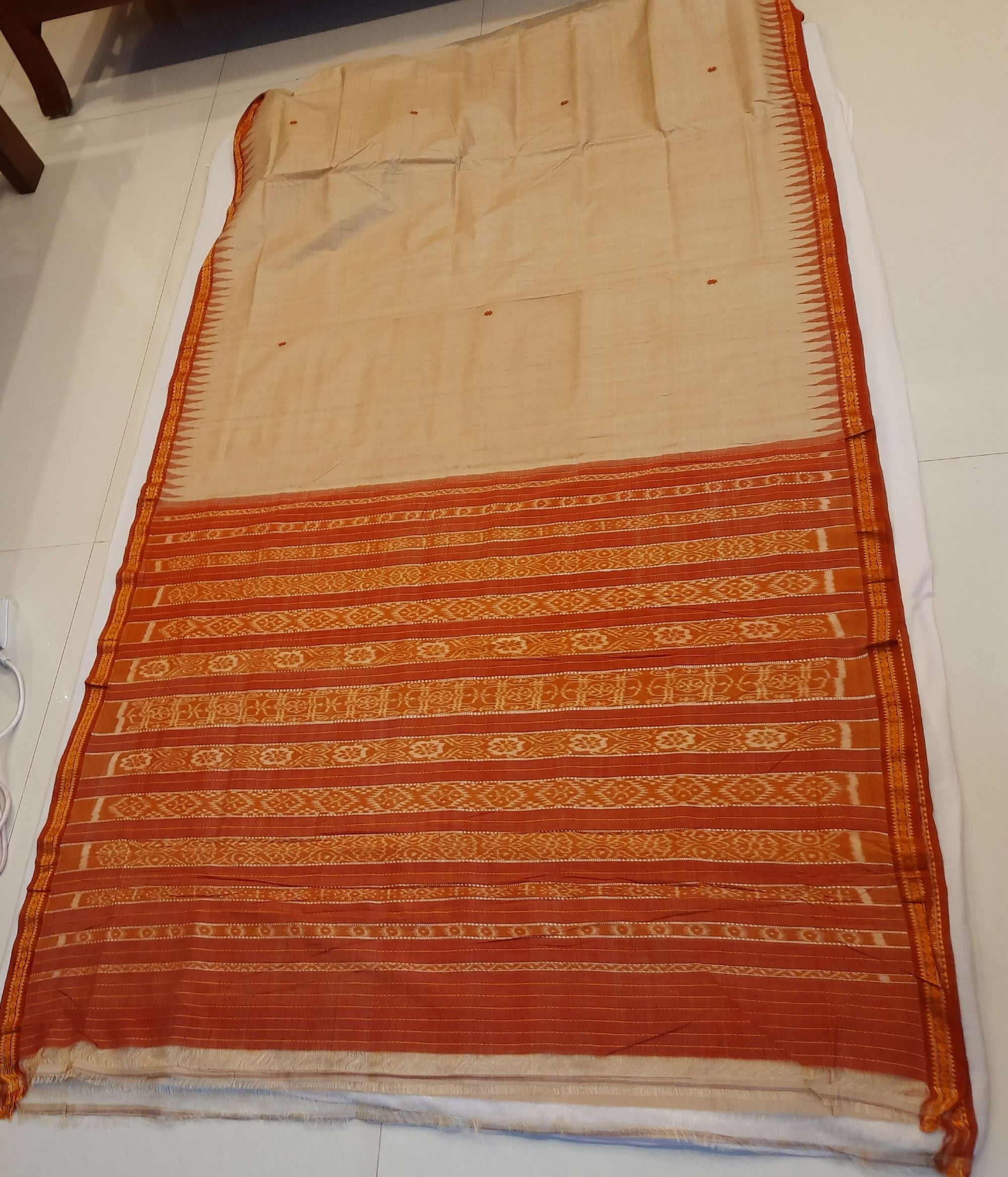 Beige Tussar Silk Odisha Ikat Saree with cotton ikat blouse piece