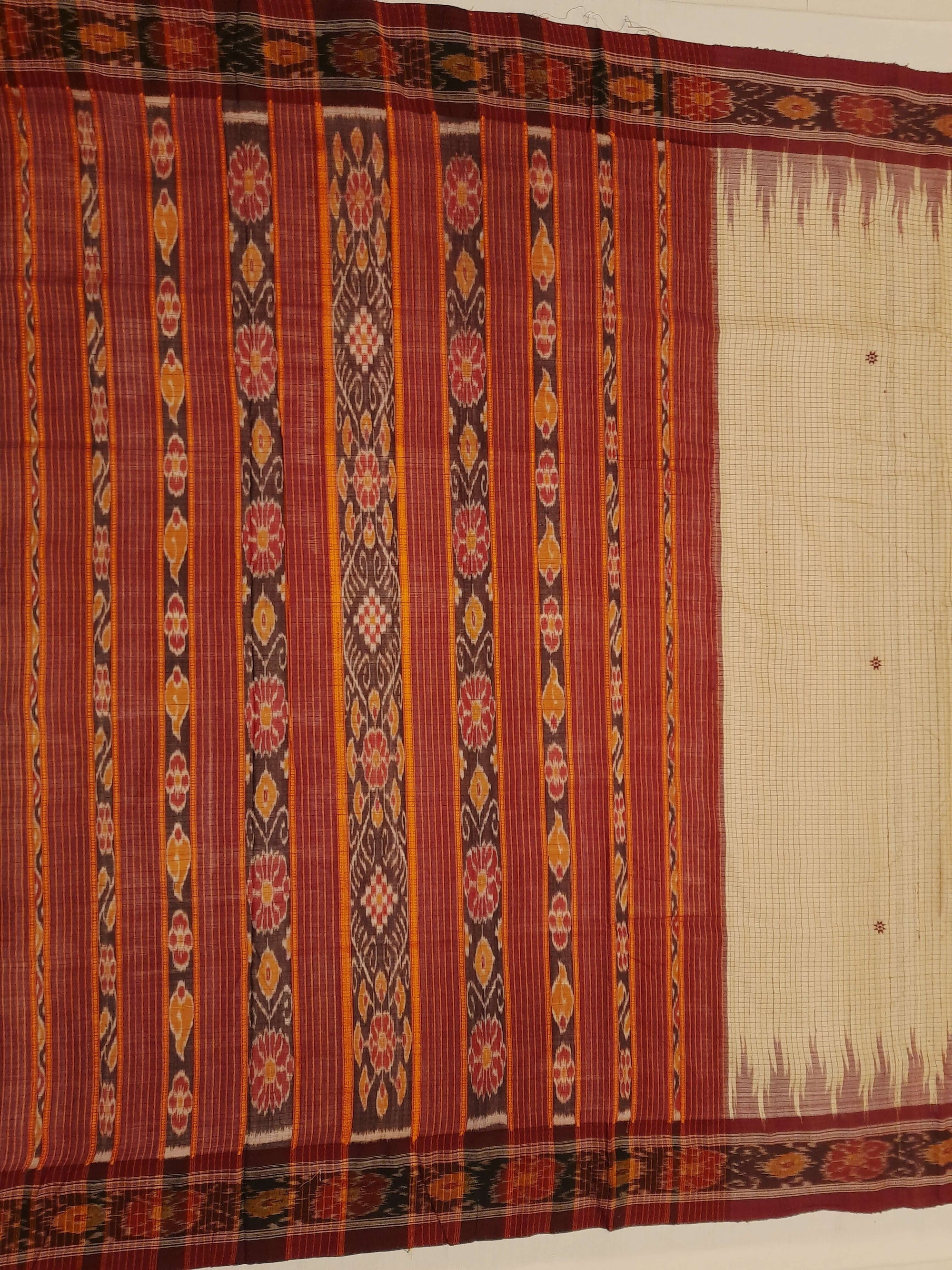 Beige checkered body Tussar Silk Odisha Ikat Saree with cotton ikat blouse piece