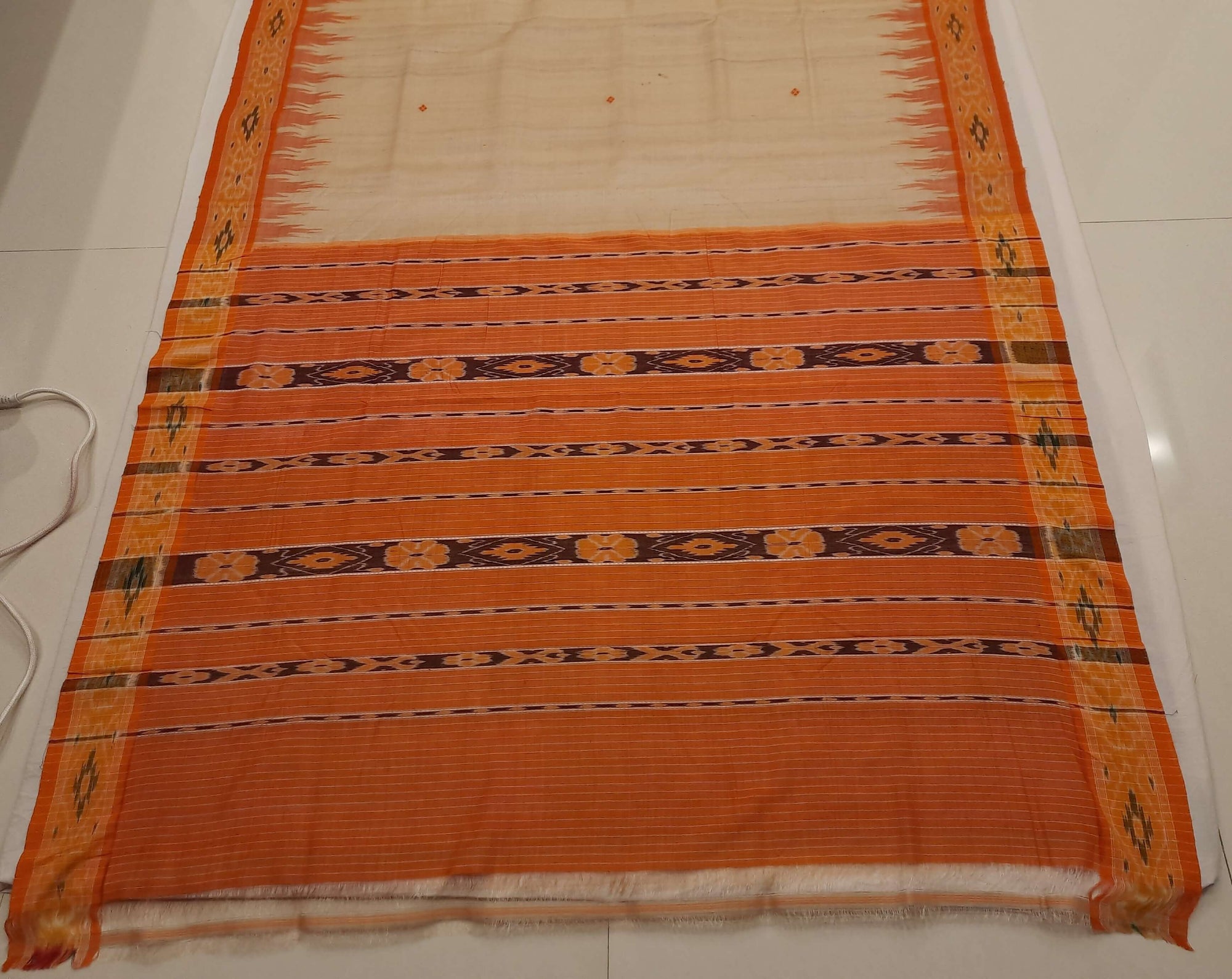 Beige with Orange Tussar Silk Odisha Ikat Saree with cotton ikat blouse piece
