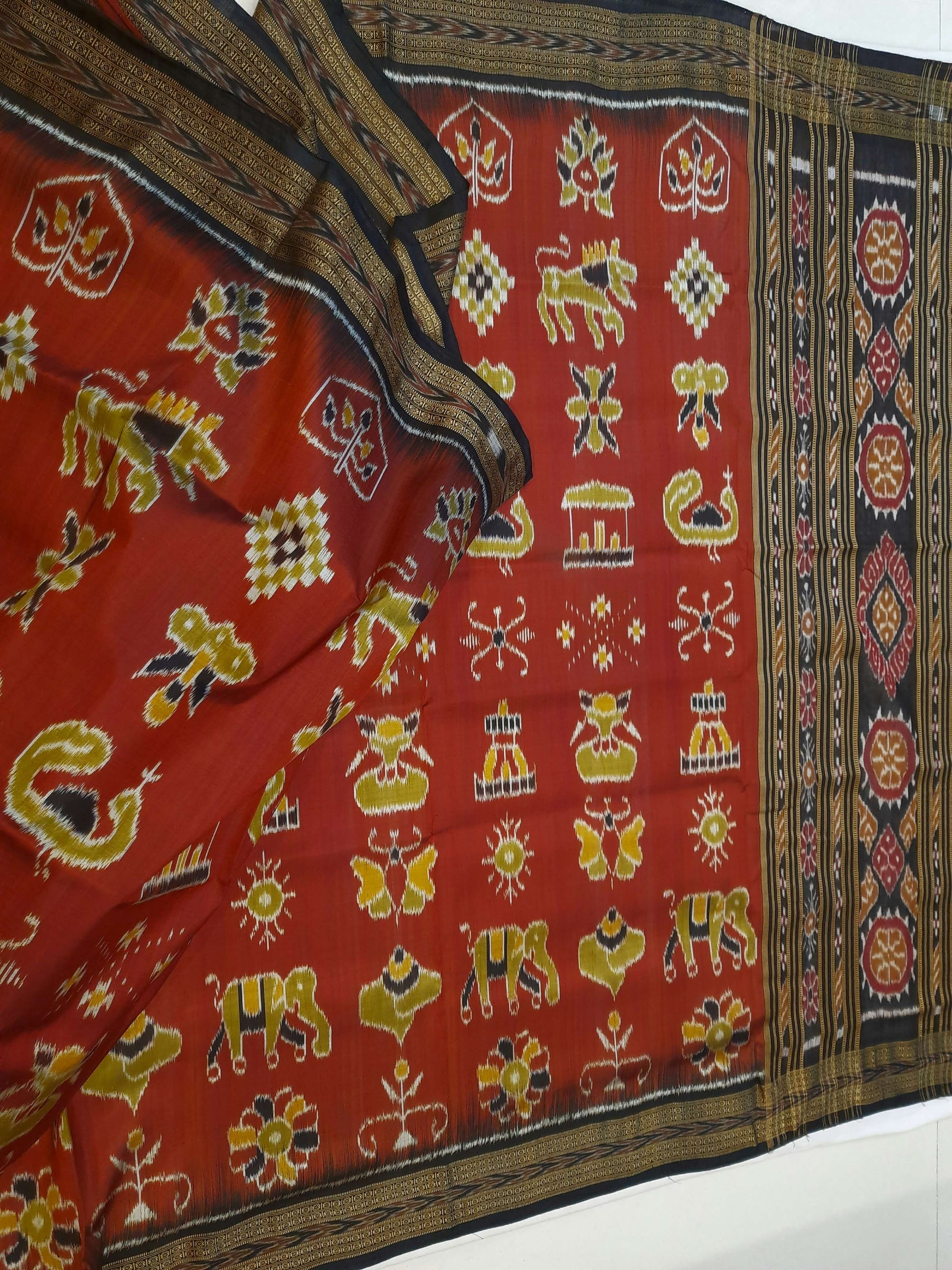Maroon Odisha Khandua Pata Silk Saree paired with cotton ikat blouse piece