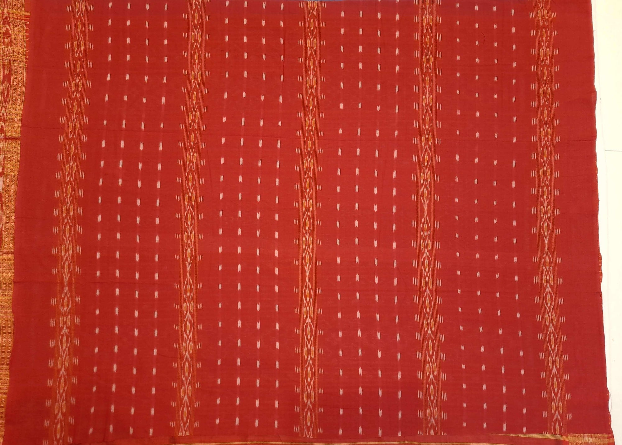 Beige and Red coloured Odisha Ikat saree  with cotton ikat blouse piece