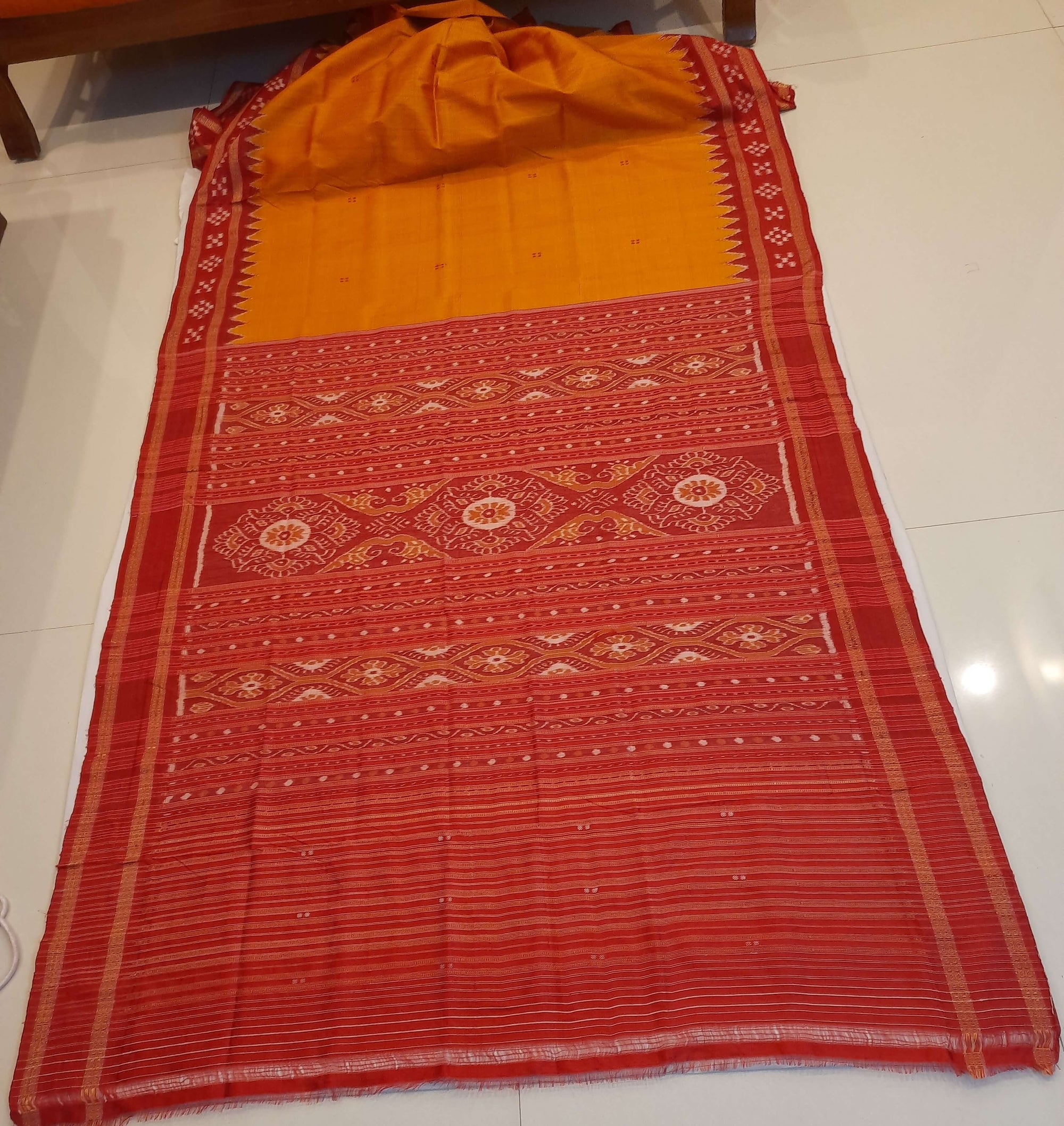 Golden Odisha Khandua Pata Silk Saree paired with cotton ikat blouse piece