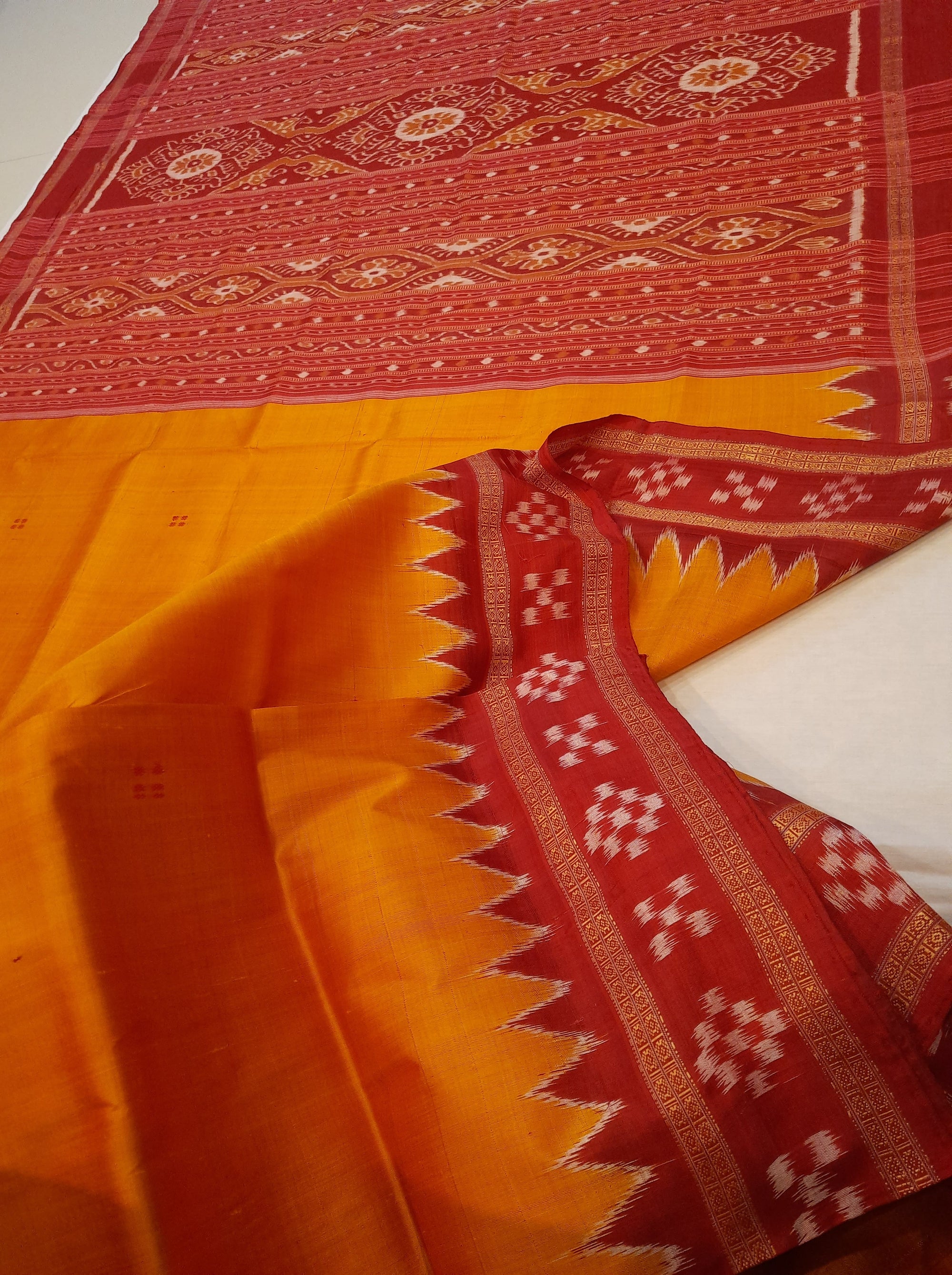 Golden Odisha Khandua Pata Silk Saree paired with cotton ikat blouse piece