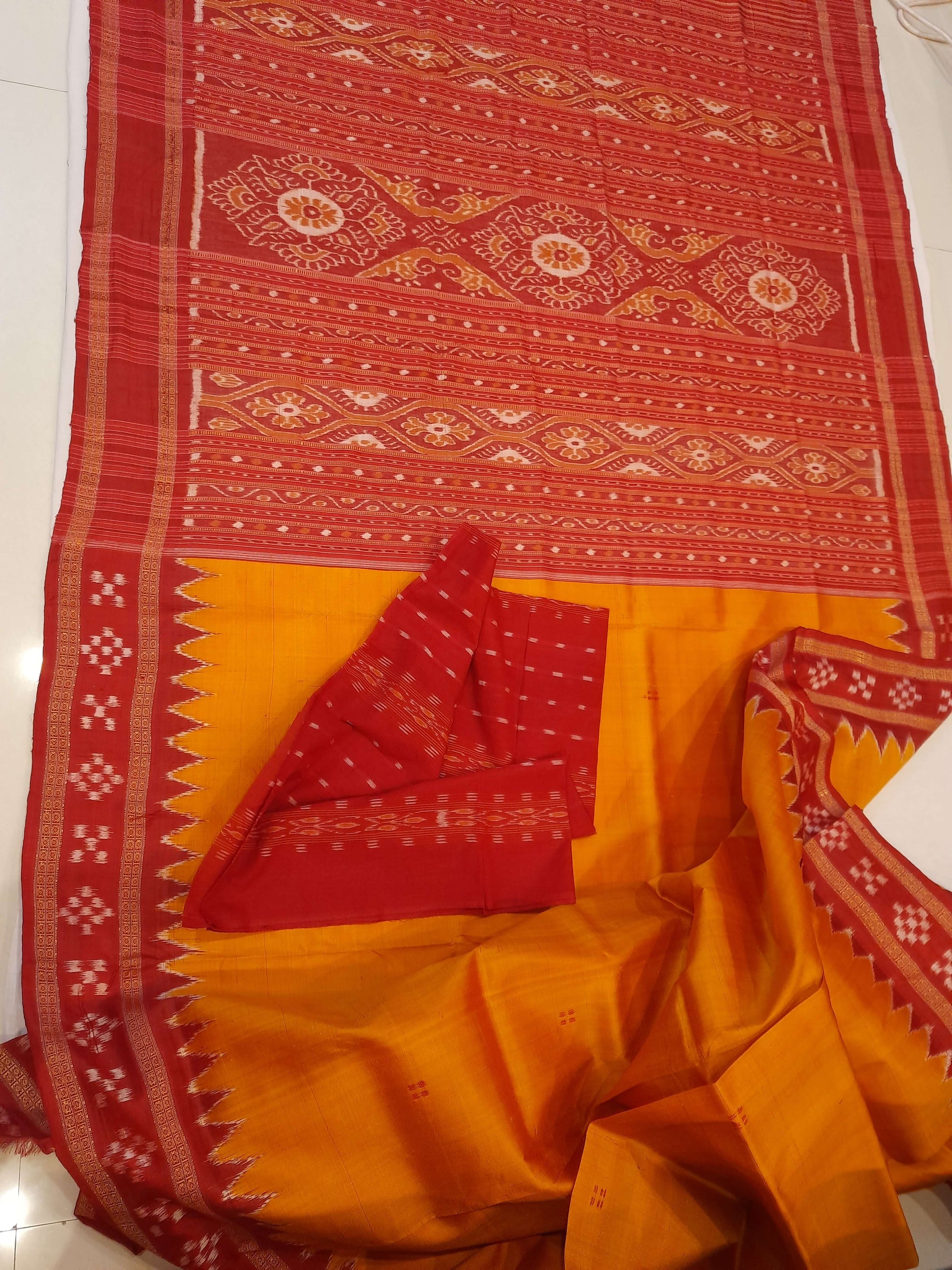 Golden Odisha Khandua Pata Silk Saree paired with cotton ikat blouse piece