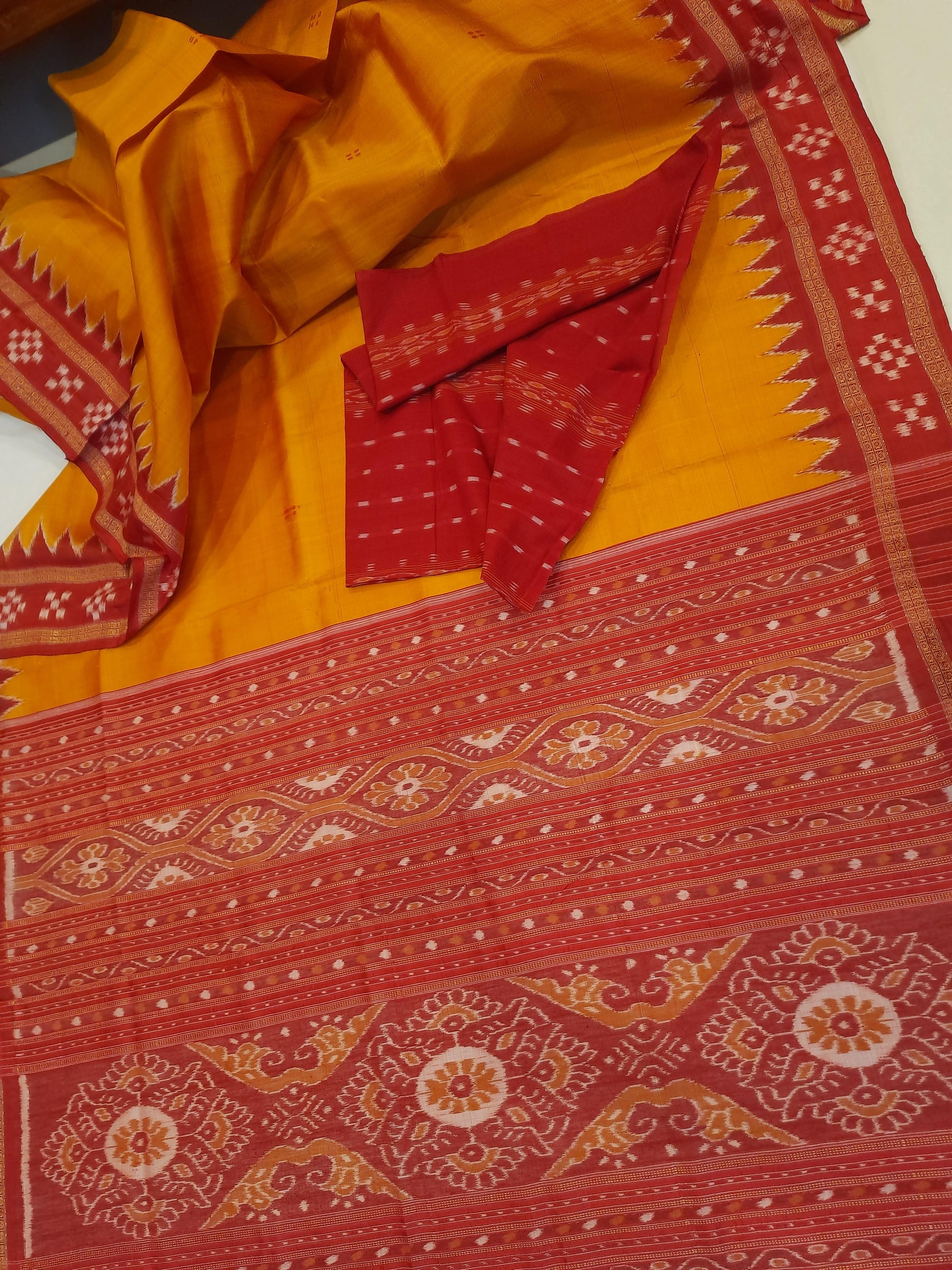 Golden Odisha Khandua Pata Silk Saree paired with cotton ikat blouse piece